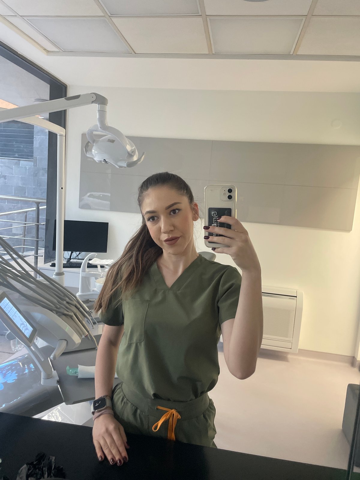 Dental worker takes early morning selfies in Sofia office