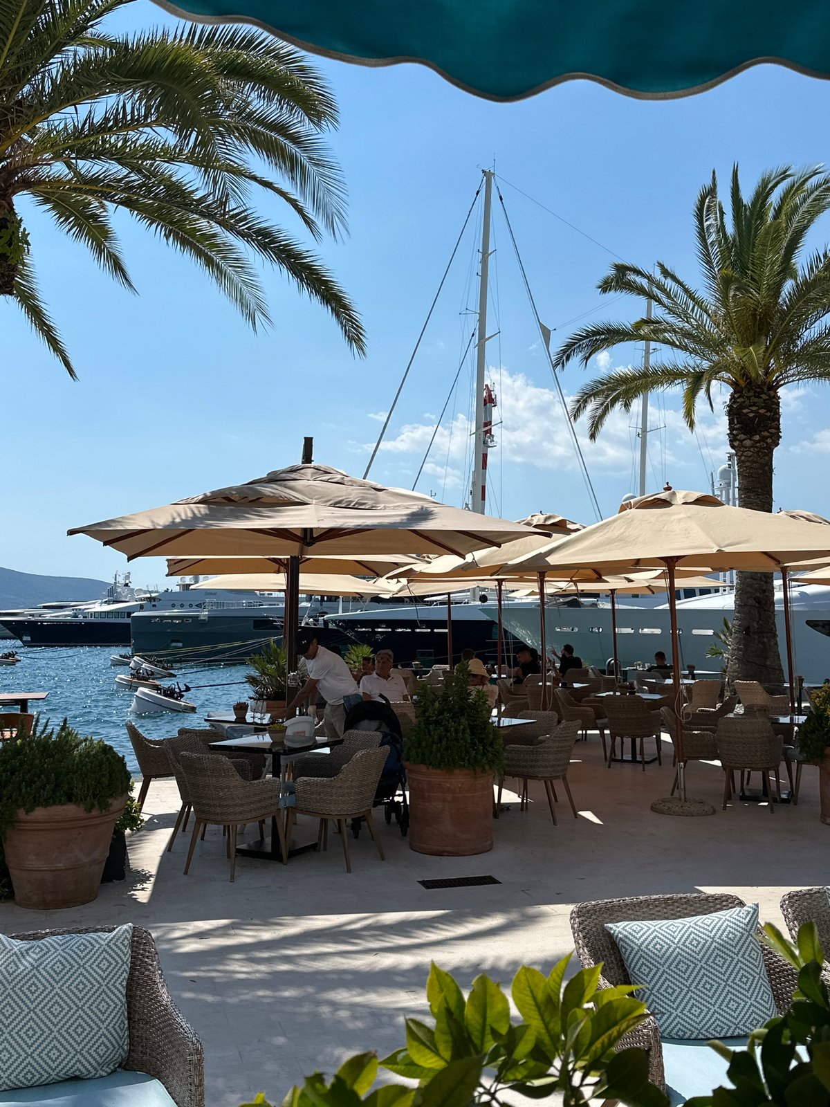 Sunny afternoon at a waterfront café in Montenegro