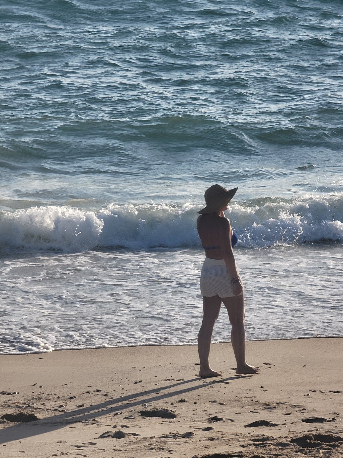 Quarteira beach alive with late afternoon activity along the Atlantic.
