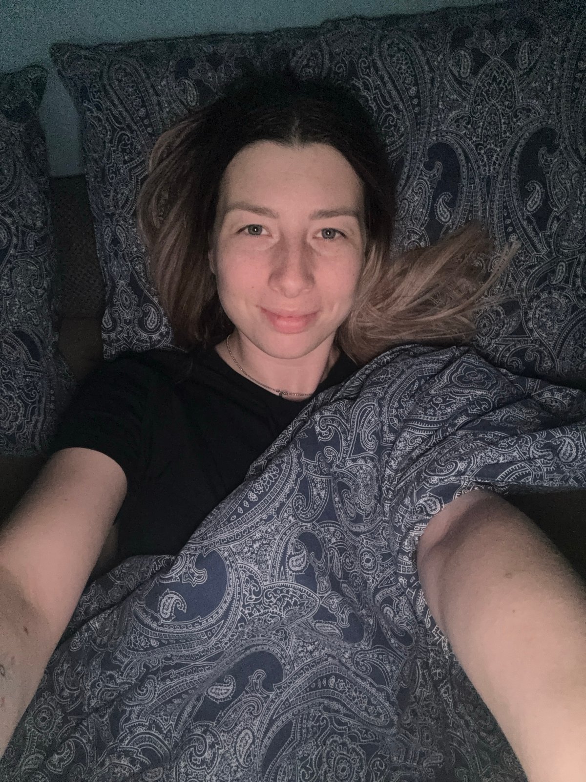 Mother and child photographed at bedtime in Moscow home