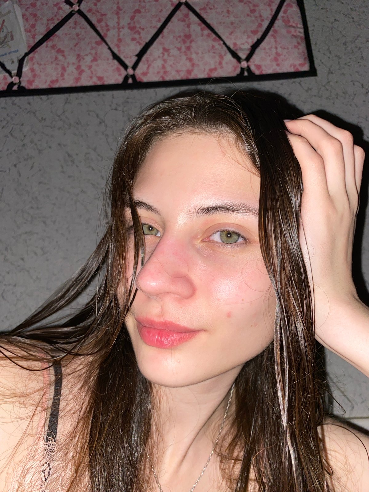 Young person takes multiple indoor selfies in Votkinsk