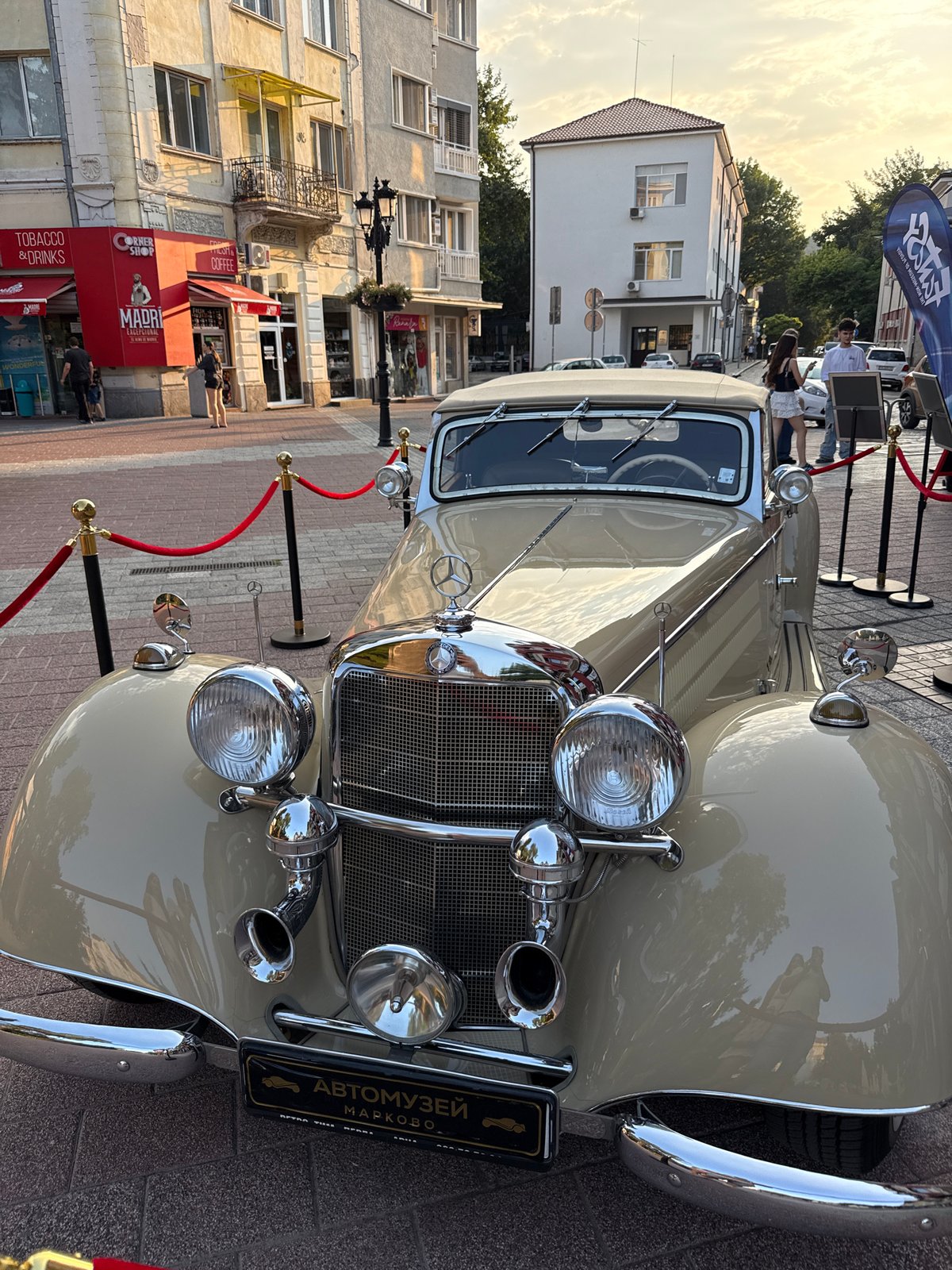 Vintage Mercedes convertible parked on Plovdiv's cobblestone streets