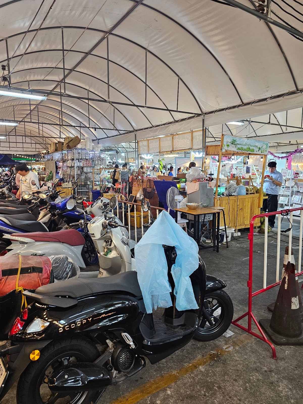 Bangkok street scene: markets, durian, and a rainy sidewalk