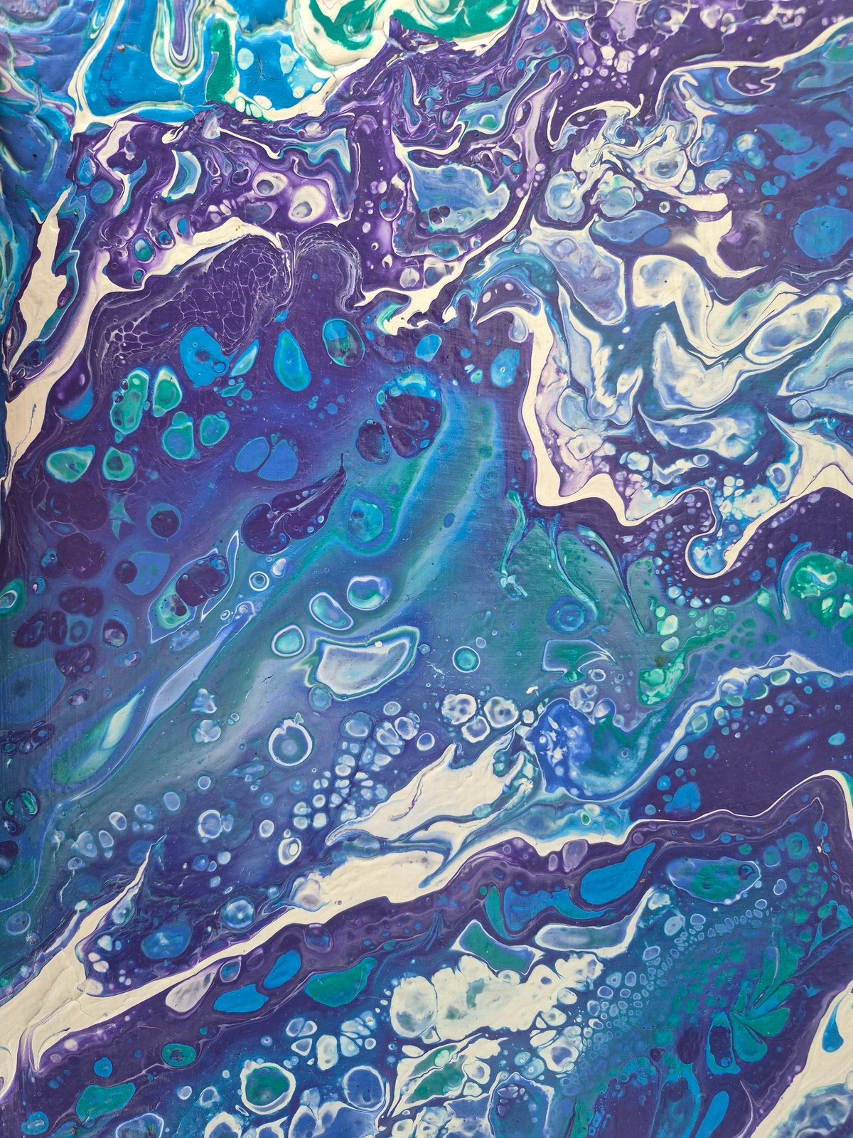 Acrylic pour paintings up close in Minsk