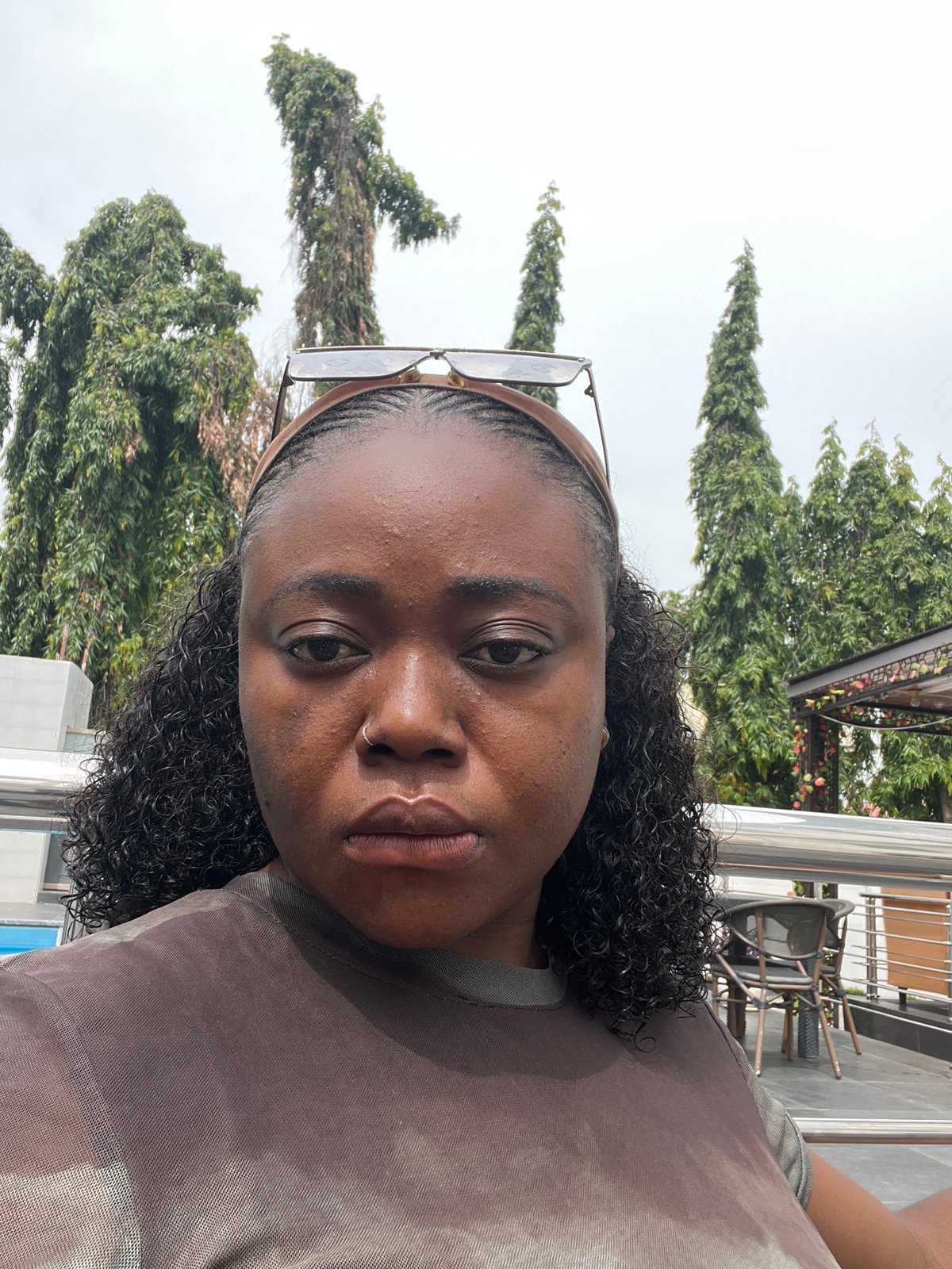 Woman documents hotel visit with selfies in Abuja