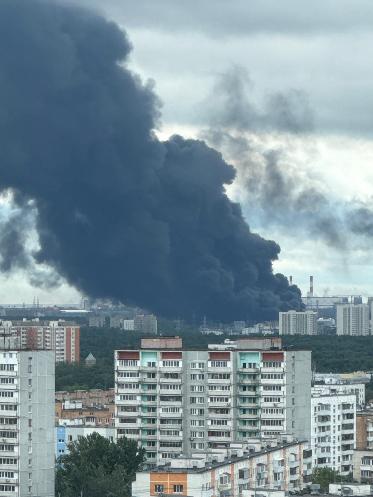 Heavy black smoke rises over Moscow from apparent industrial fire