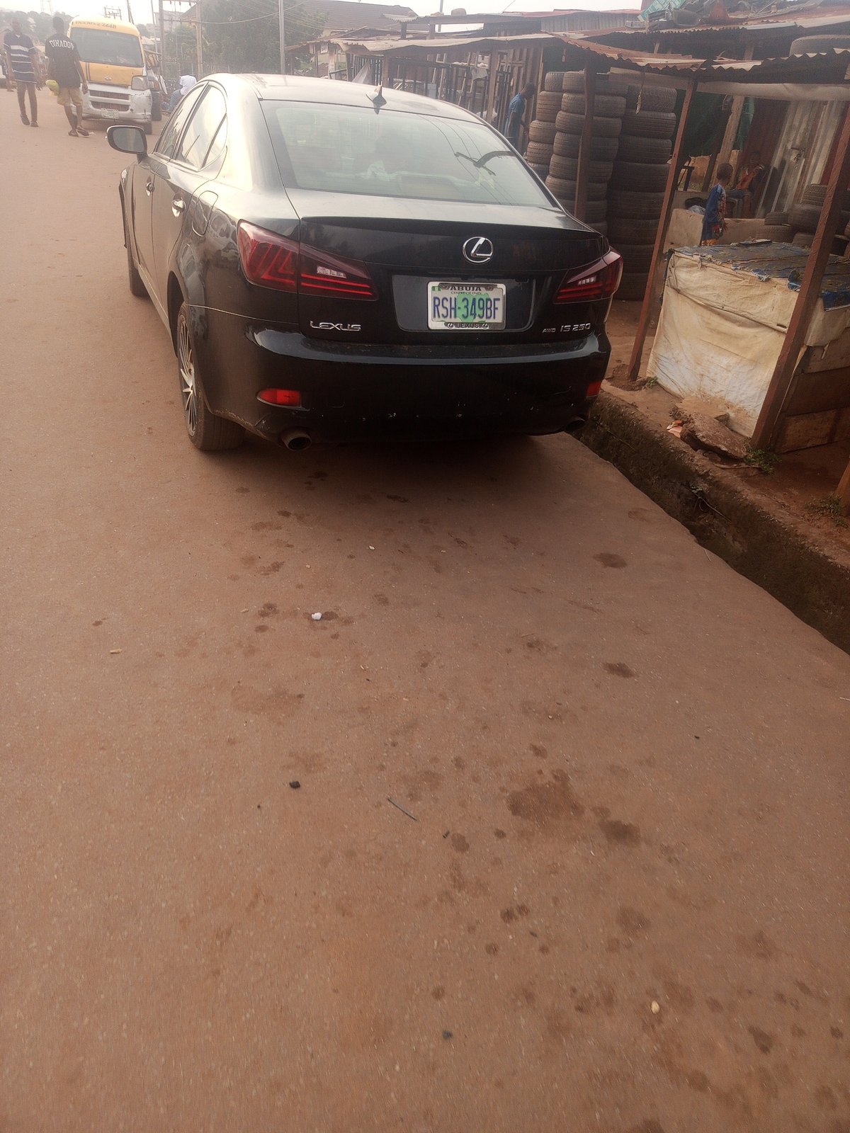 Street life and commerce in Enugu on a June afternoon