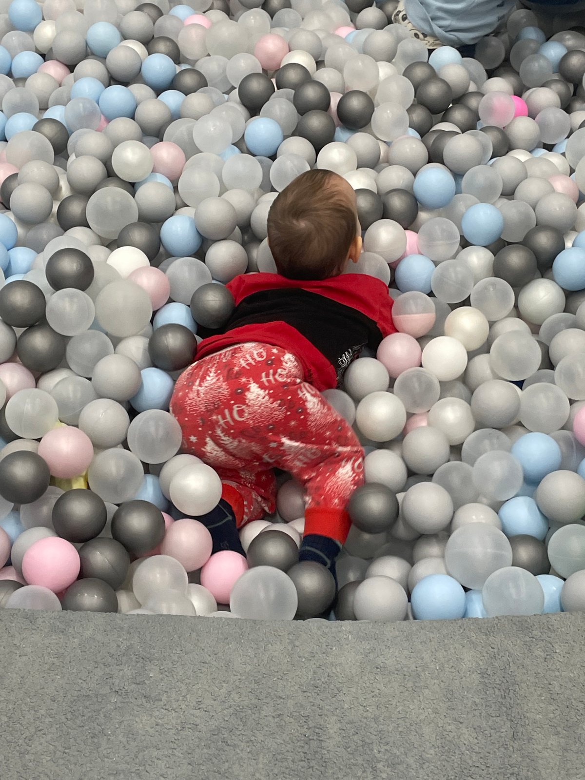 Family enjoys afternoon at indoor playground in Perm, Russia