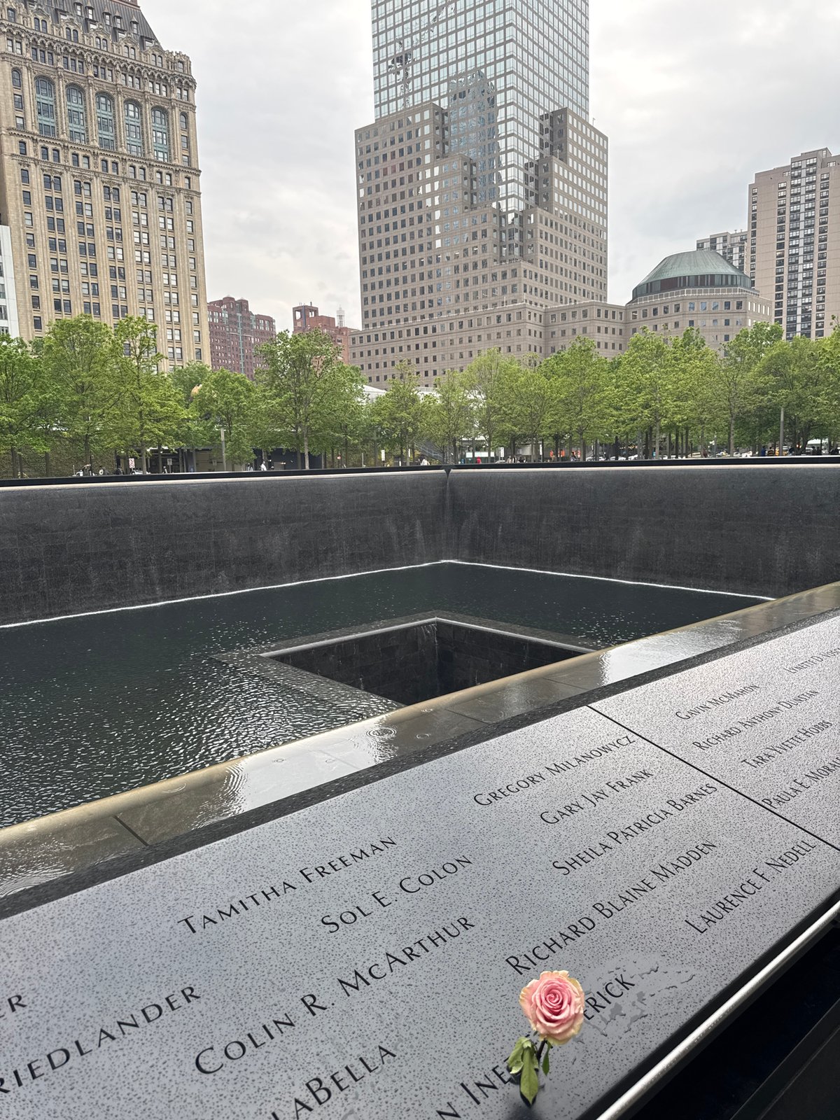 Visitor documents 9/11 Memorial and Oculus at World Trade Center