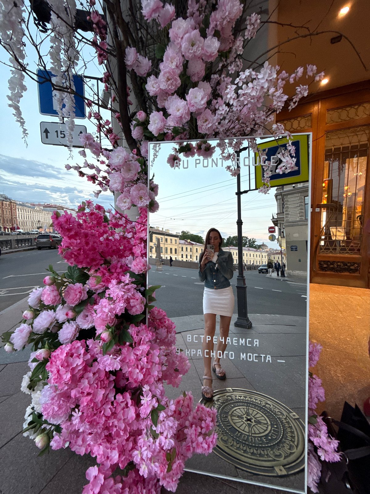 Evening street life documented across central Saint Petersburg landmarks