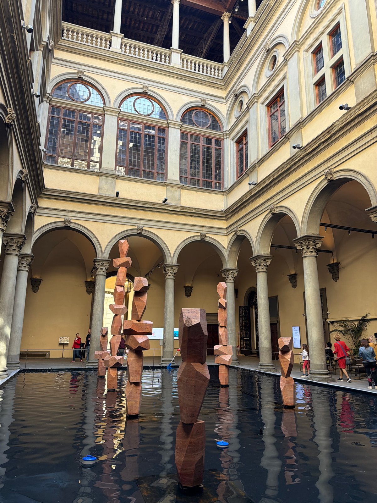 Morning scenes documented across Florence's historic palazzos and shopping districts