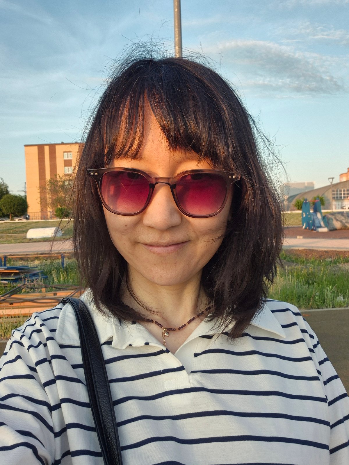 Afternoon park activities captured during sunset in Kokshetau, Kazakhstan