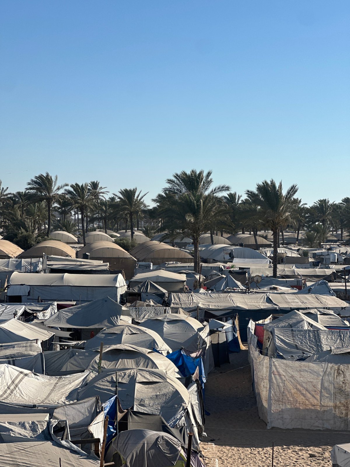 Dense temporary shelter encampment spreads across Al-Mawasi