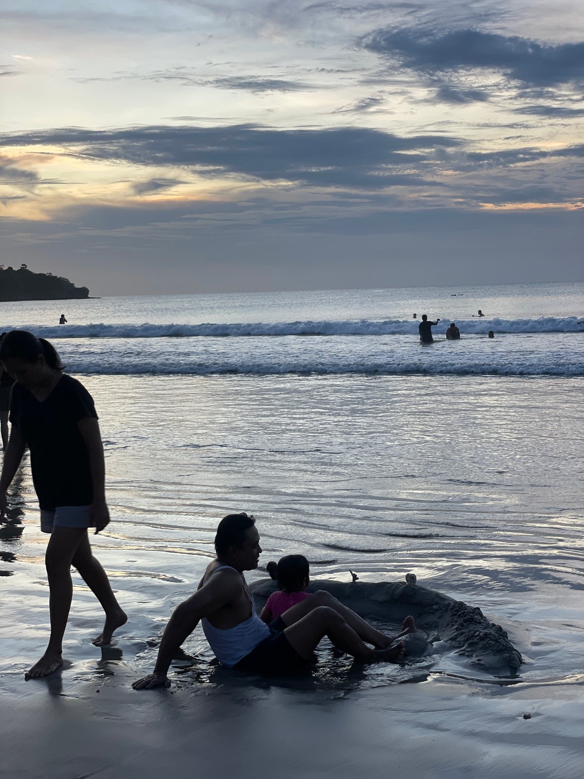 Evening beach activities captured at Kuta Selatan tourist destination