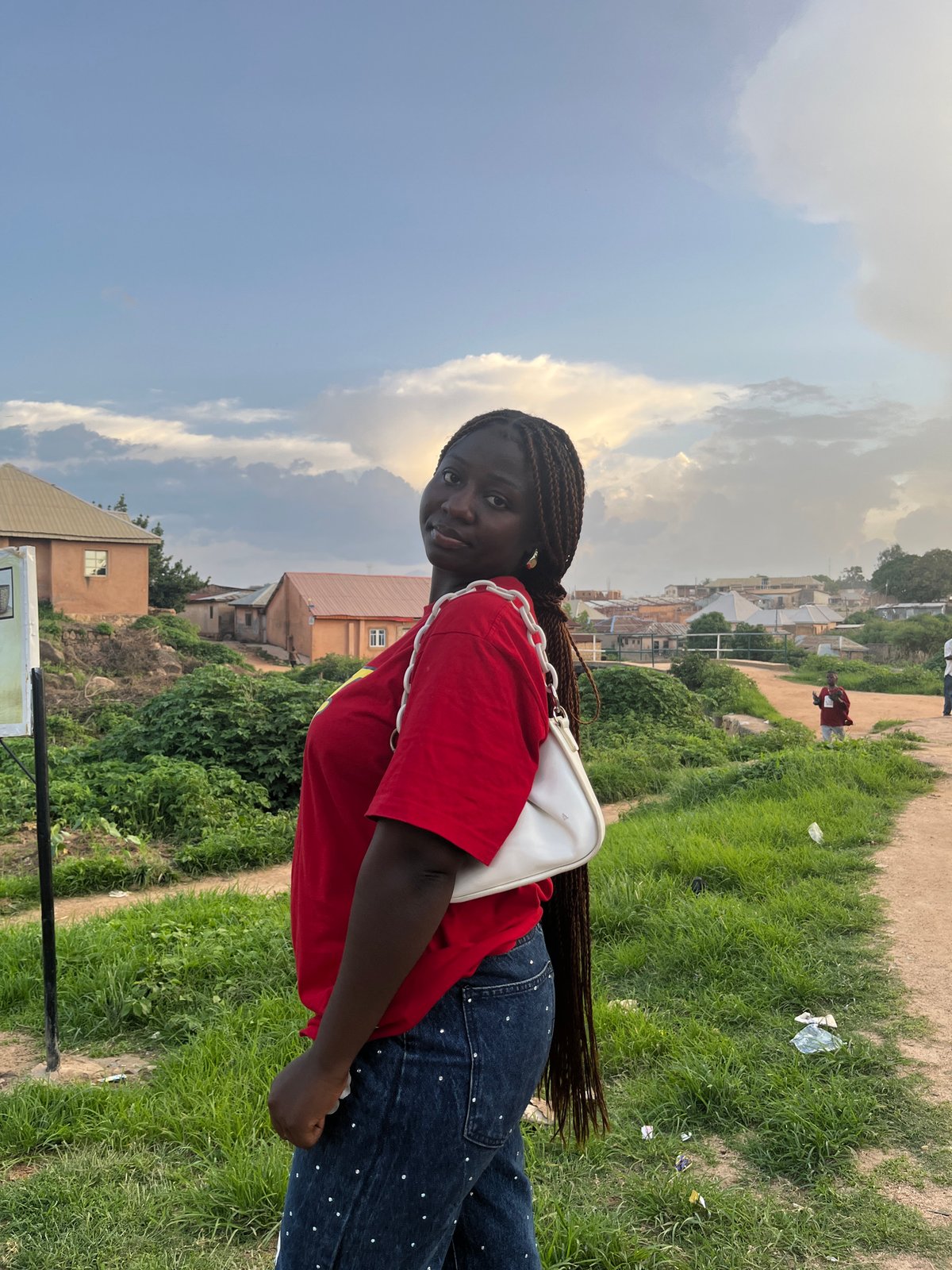 Casual afternoon hangout in a Jos, Nigeria neighborhood
