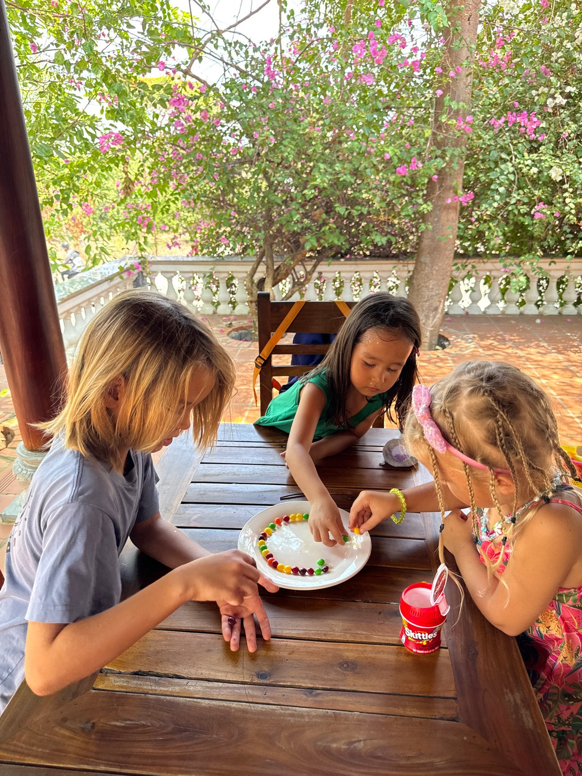 Children conduct candy science experiment in Mũi Né