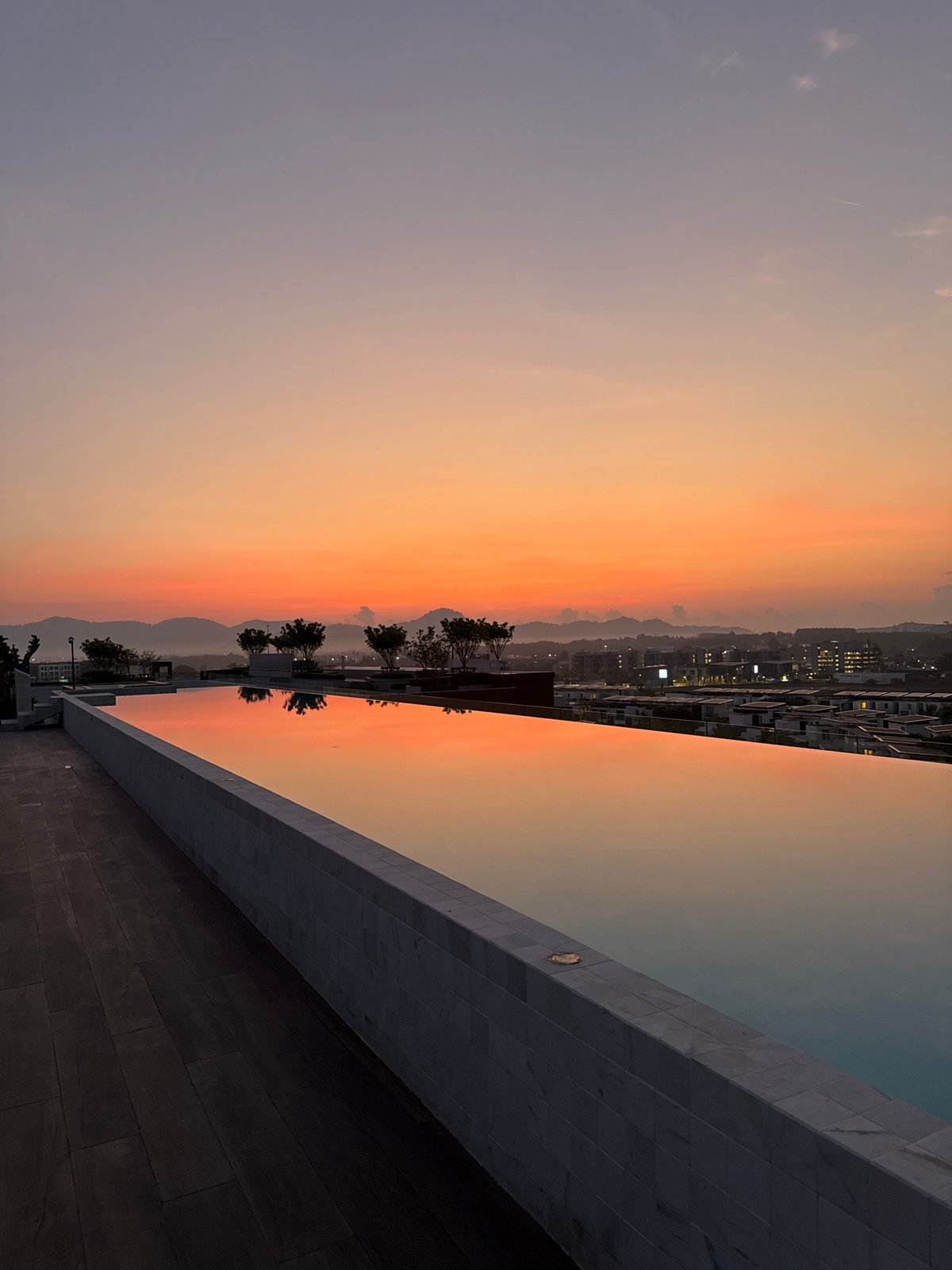Sunset captured from rooftop infinity pool in Choeng Thale