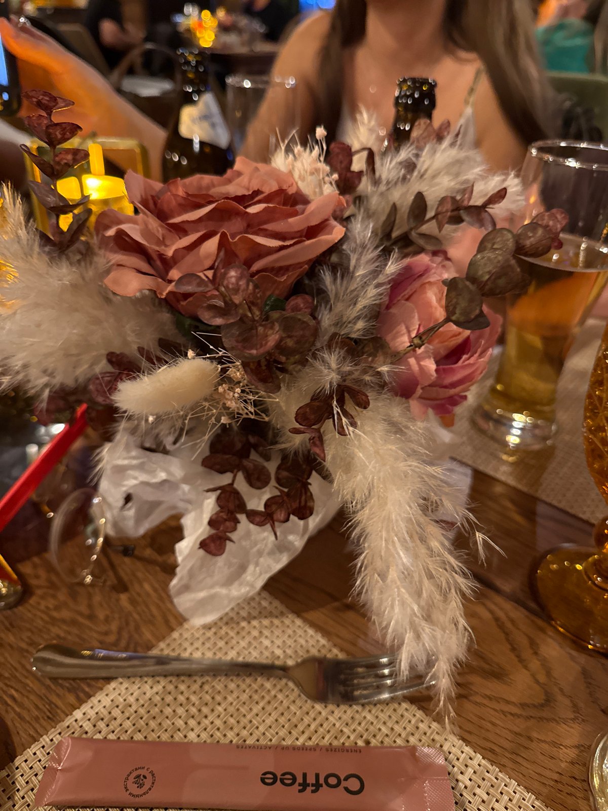 Dining moment captured at Peresvet restaurant with flowers, coffee