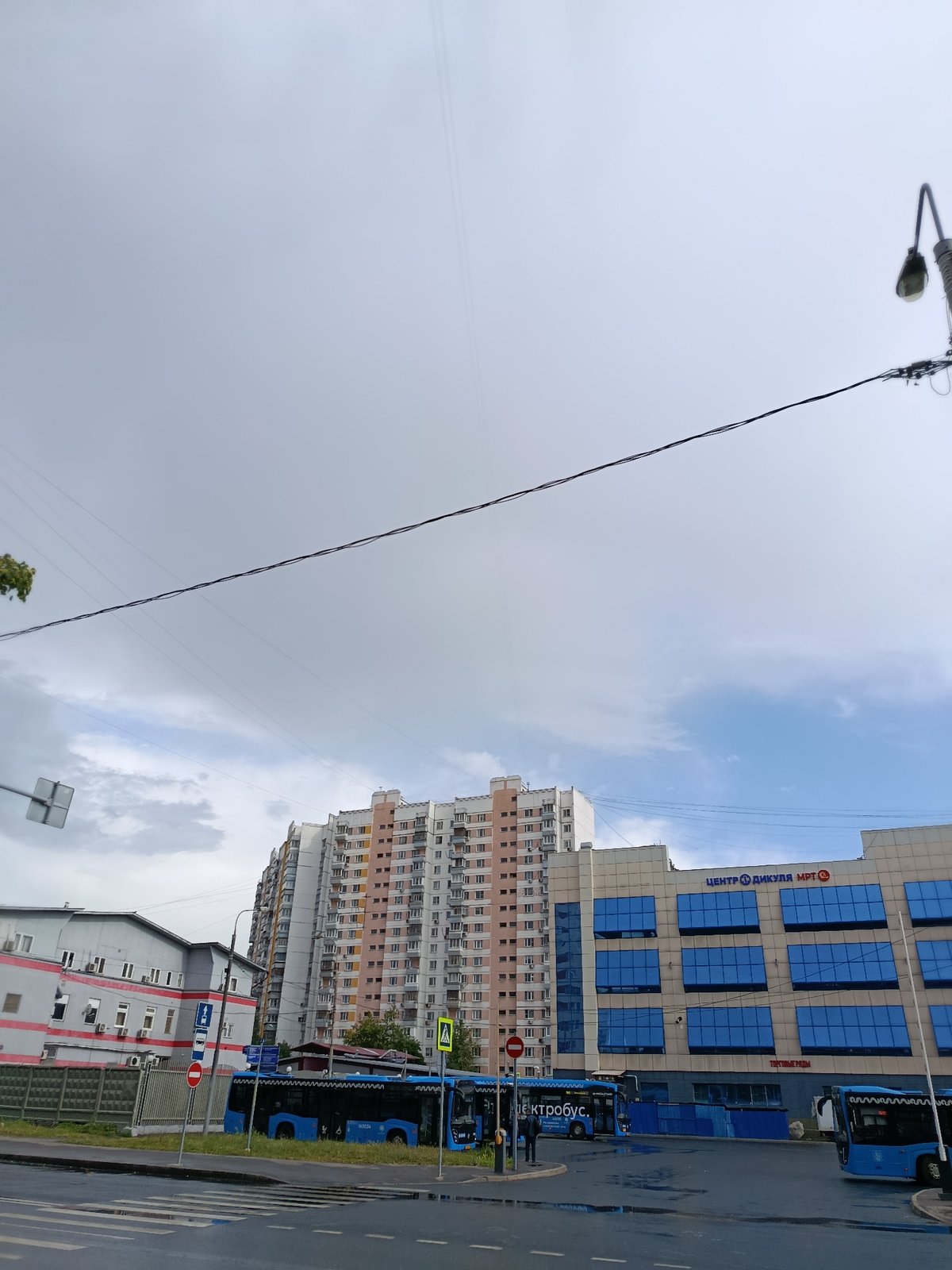 Rainy afternoon in a Moscow neighborhood mid-construction and mid-summer