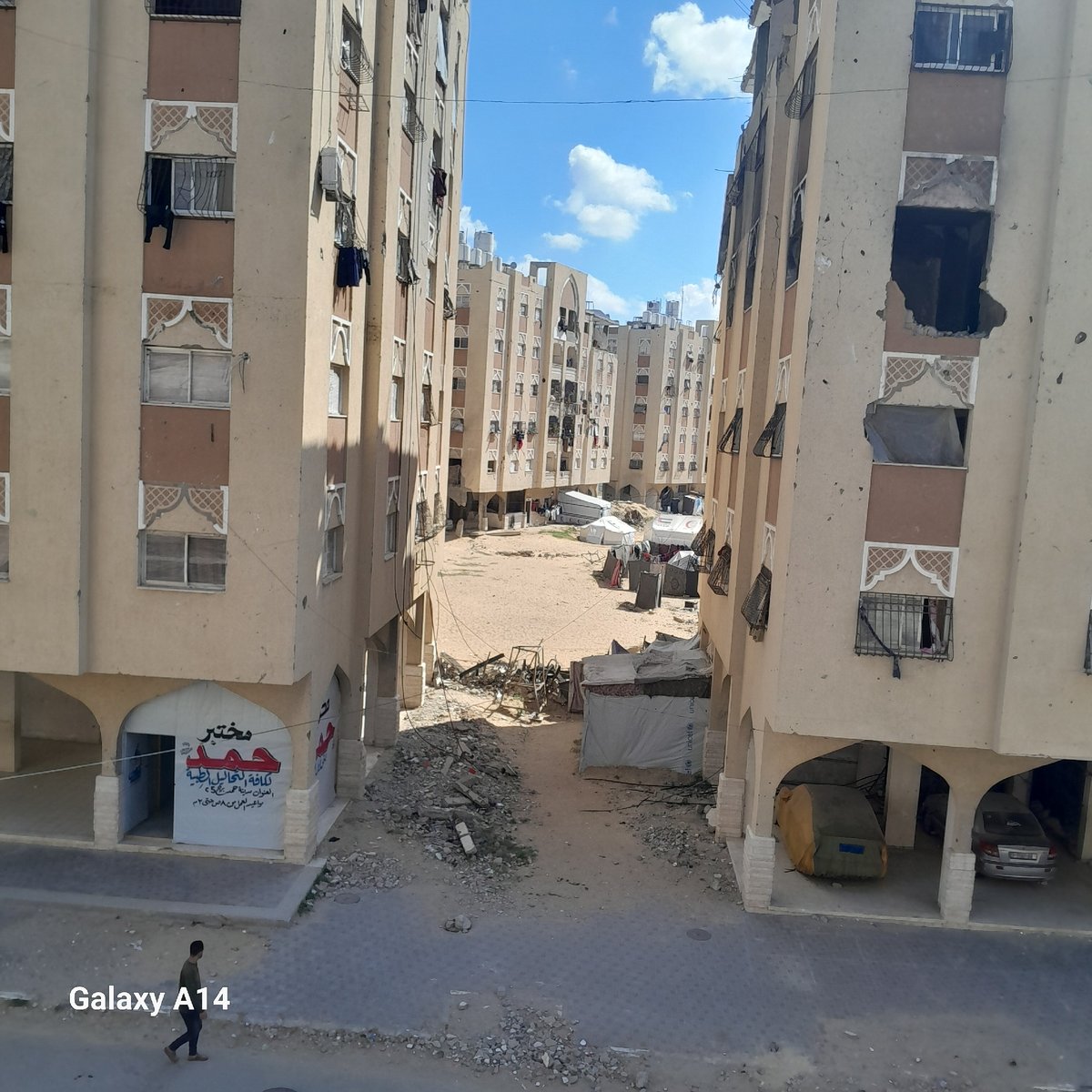 Morning street activity recorded in residential neighborhood