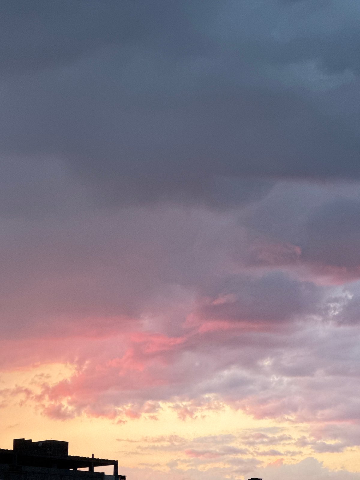 Podgorica skyline caught mid-storm and sunset in one evening