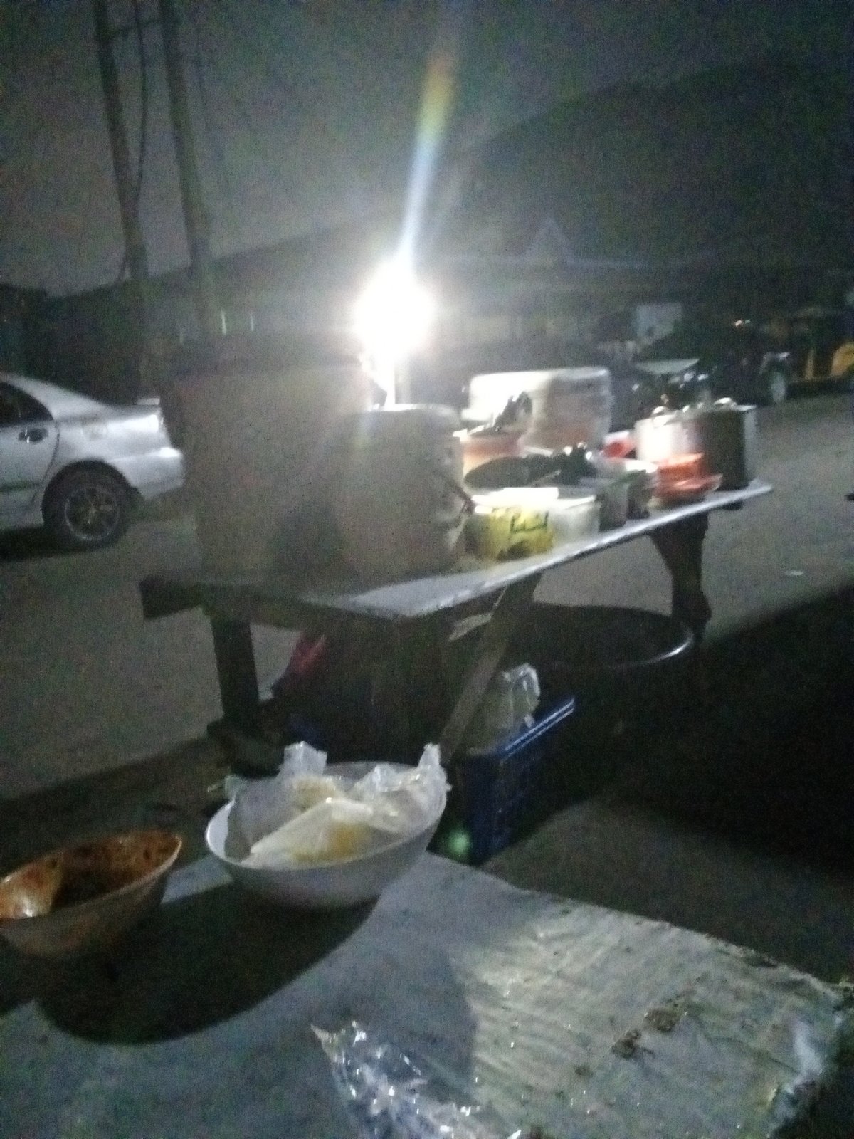 Night market activity documented in Ado, Nigeria