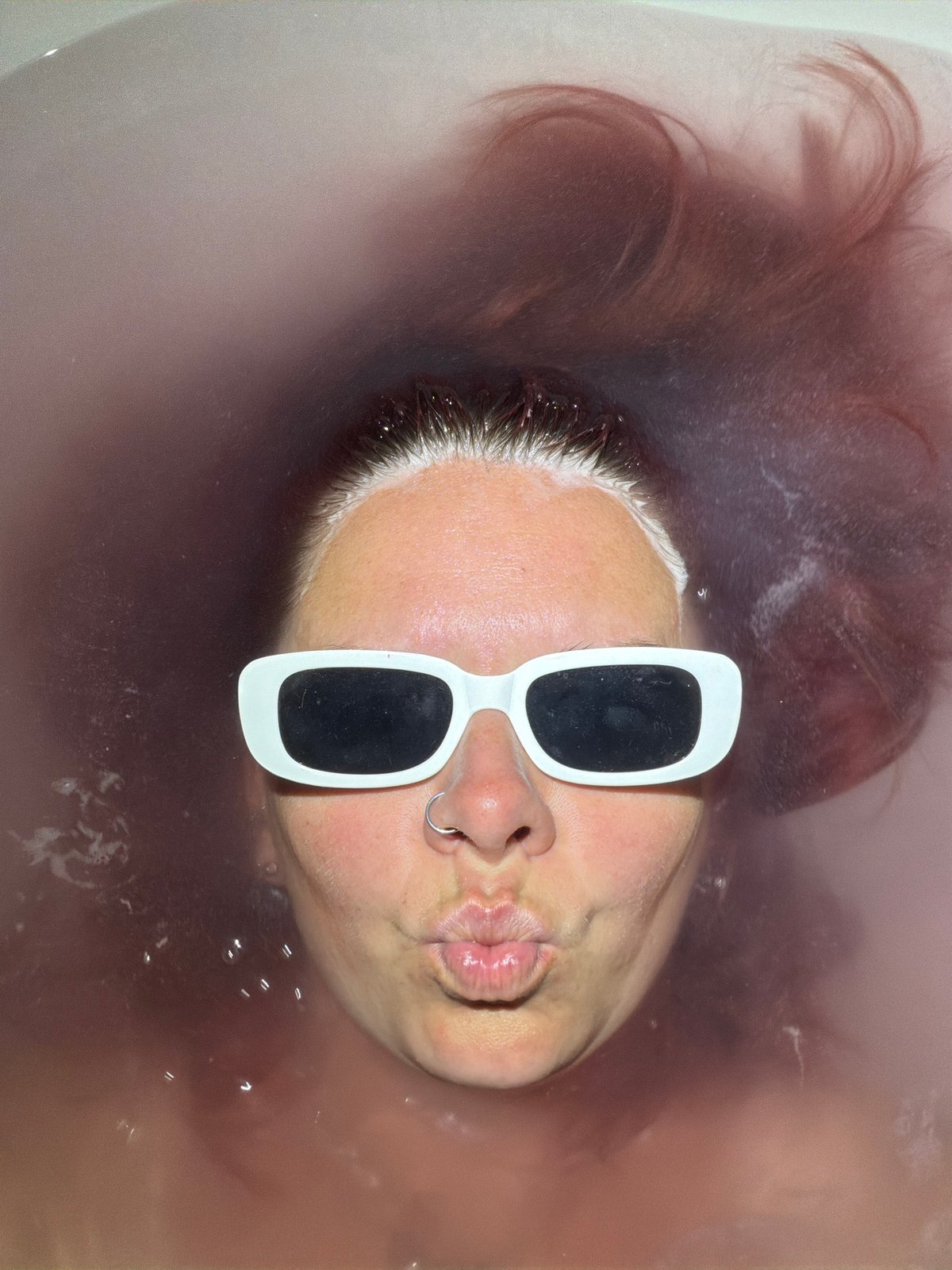Bizarre scenes: bathing figure and chicken heads documented same location