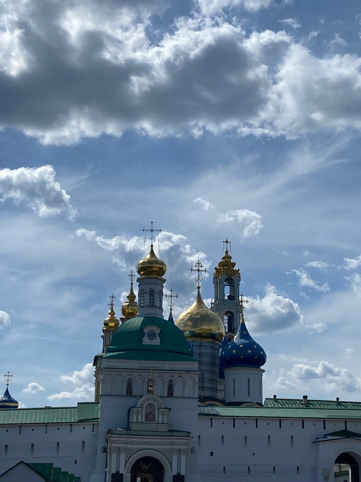 Tourist documents historic Russian monastery complex in Sergiyev Posad