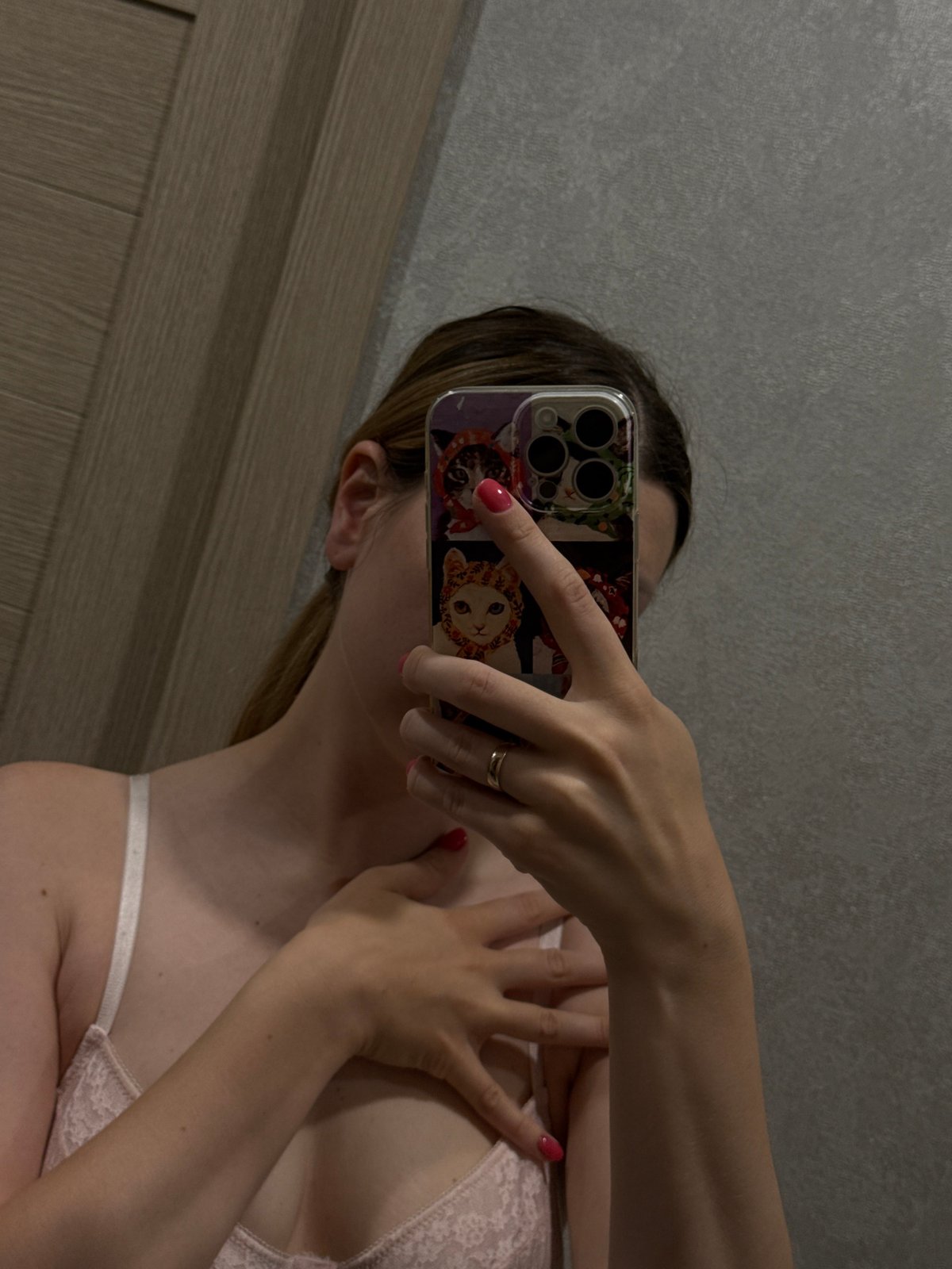 Person takes multiple selfies in Moscow apartment