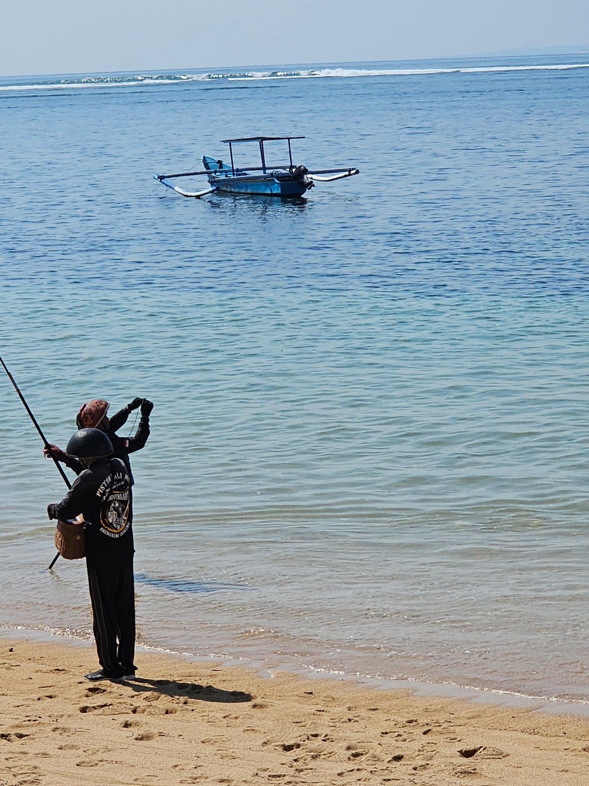 Early morning fishing activity observed on Denpasar beach