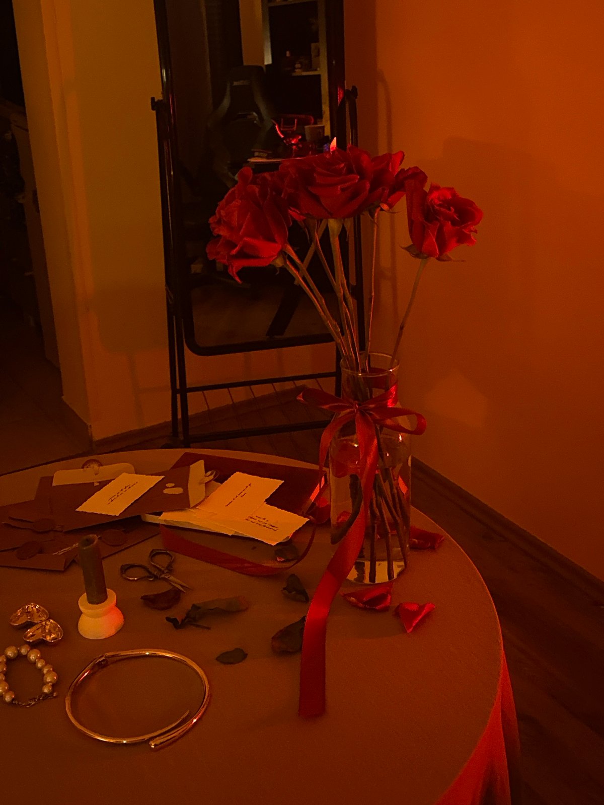 Person documents romantic table setting, takes selfies in Bar