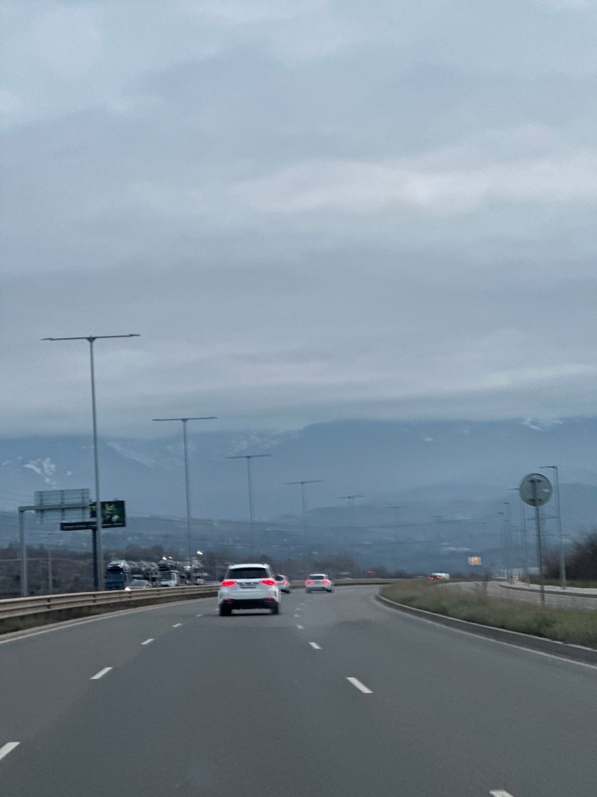Highway traffic documented near German, Bulgaria under overcast conditions