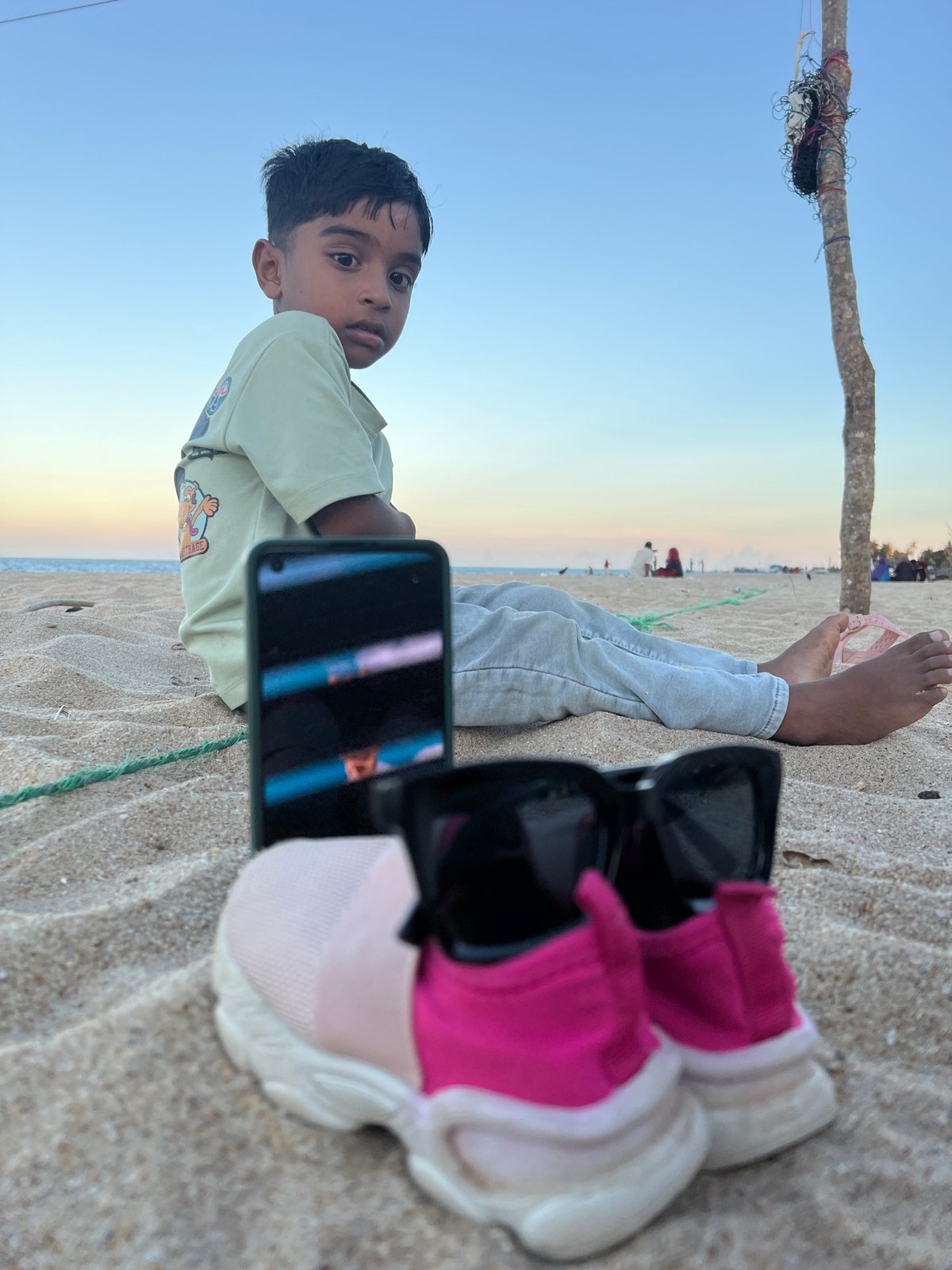Family beach day captured in Kalmunai, Sri Lanka