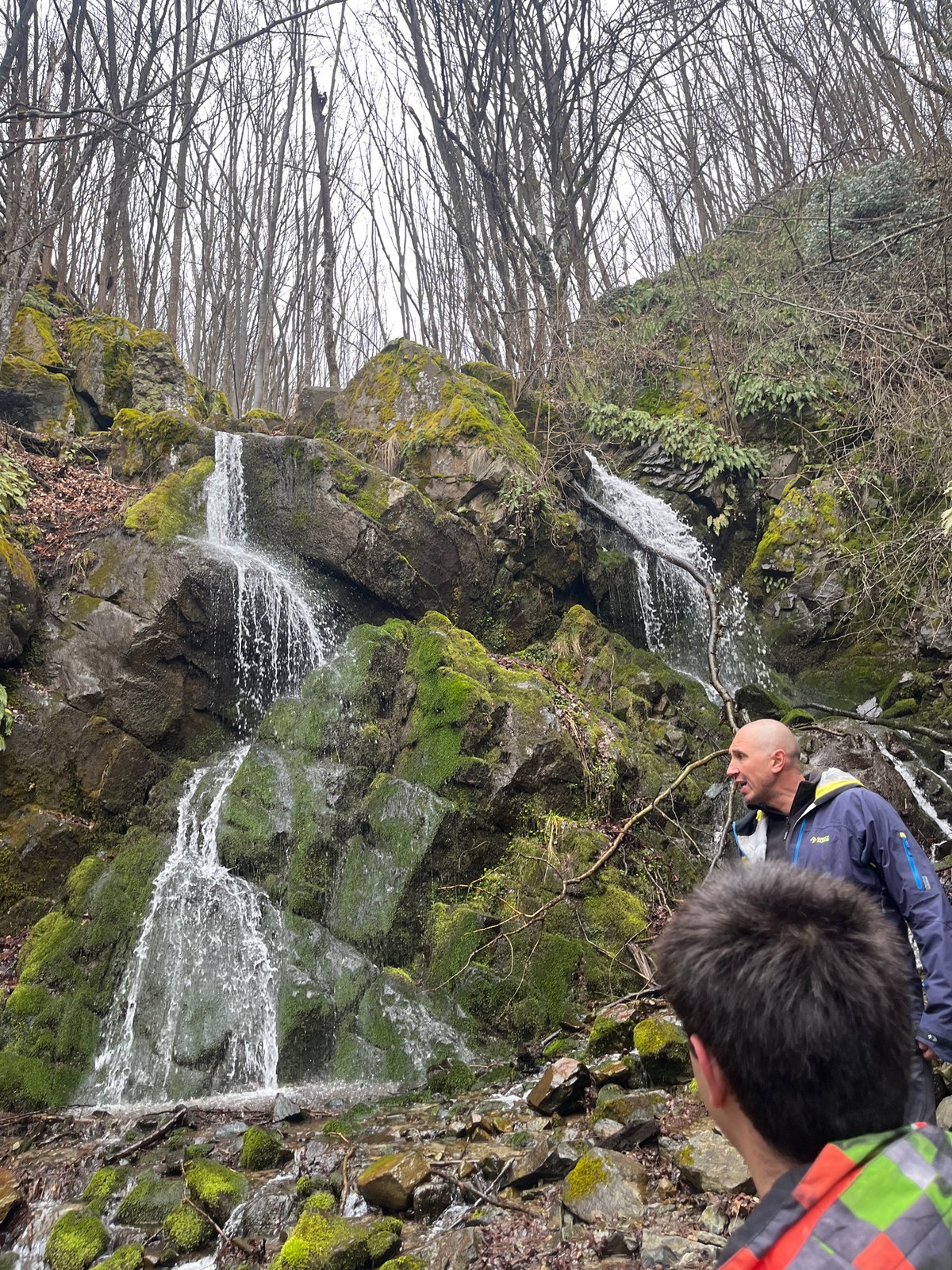 Man drinks from waterfall in Sofia Bulgaria