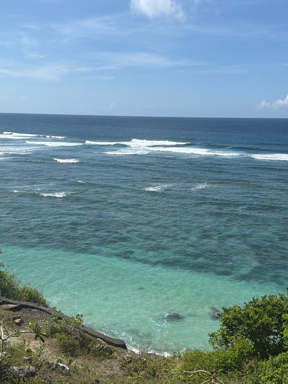 Woman documents early morning coastal tour across Bali beaches