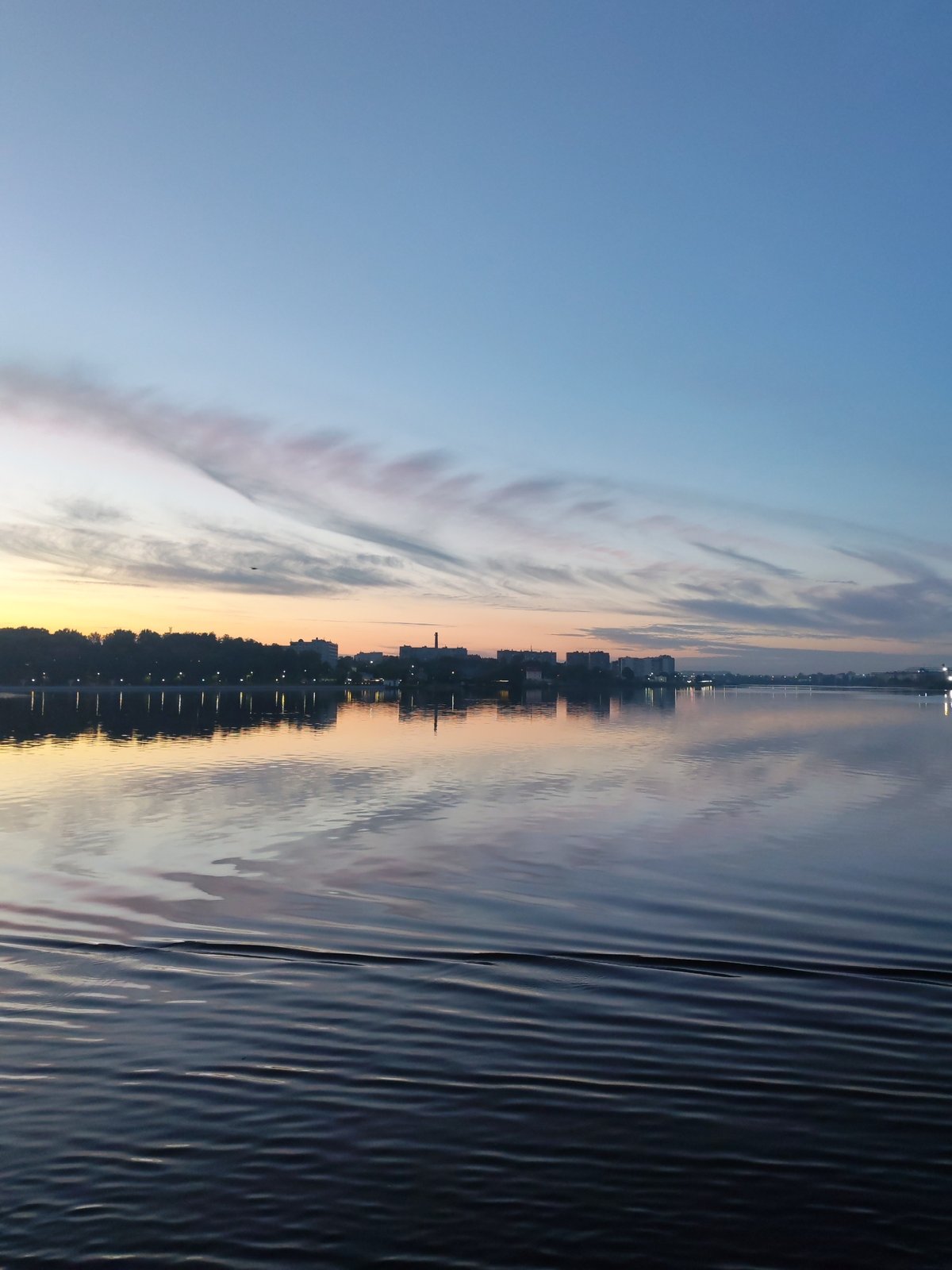 Peaceful dusk scenes captured along Sheksna River in Cherepovets