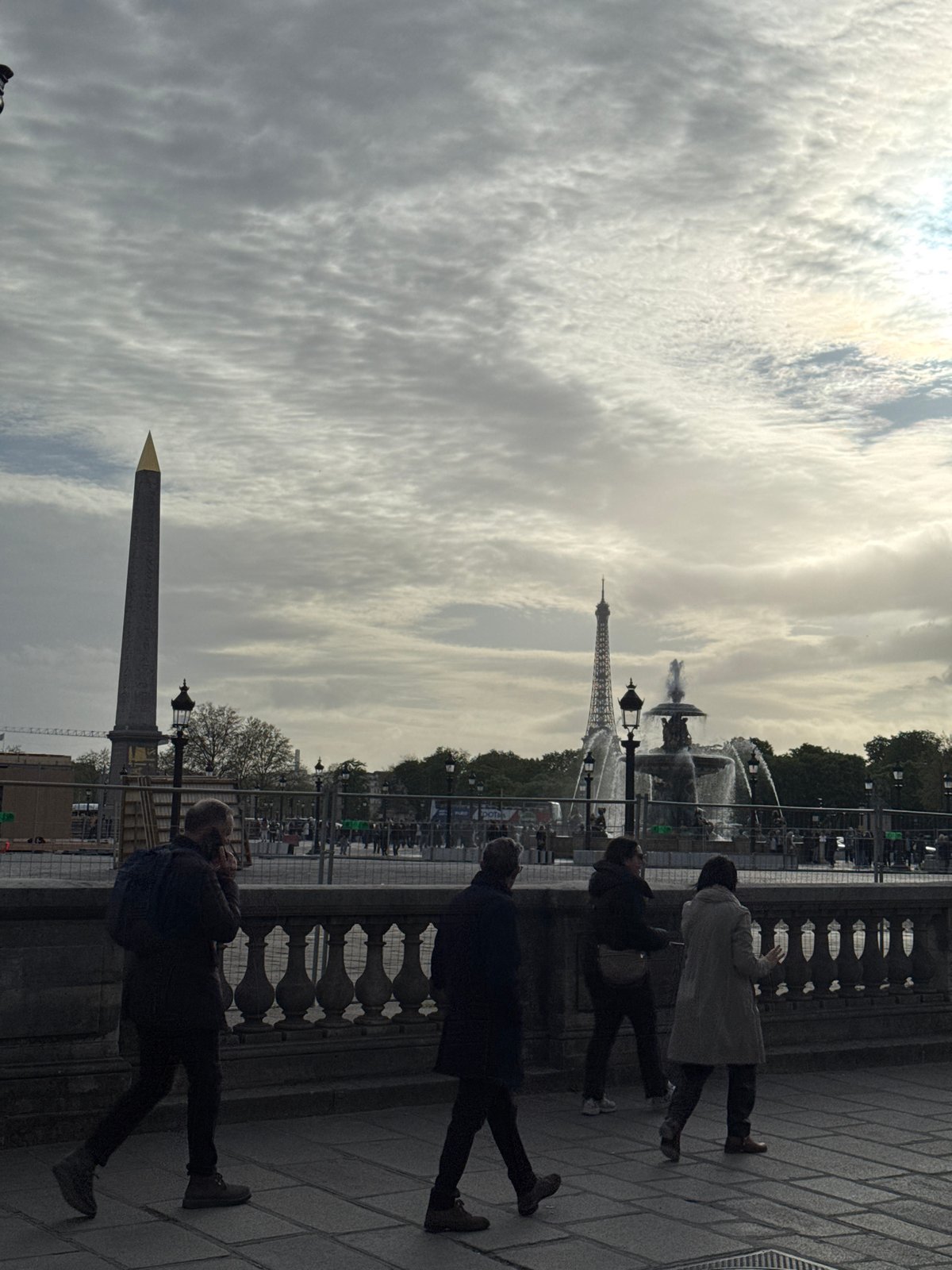 Tourist captures classic Paris vista at Place de la Concorde