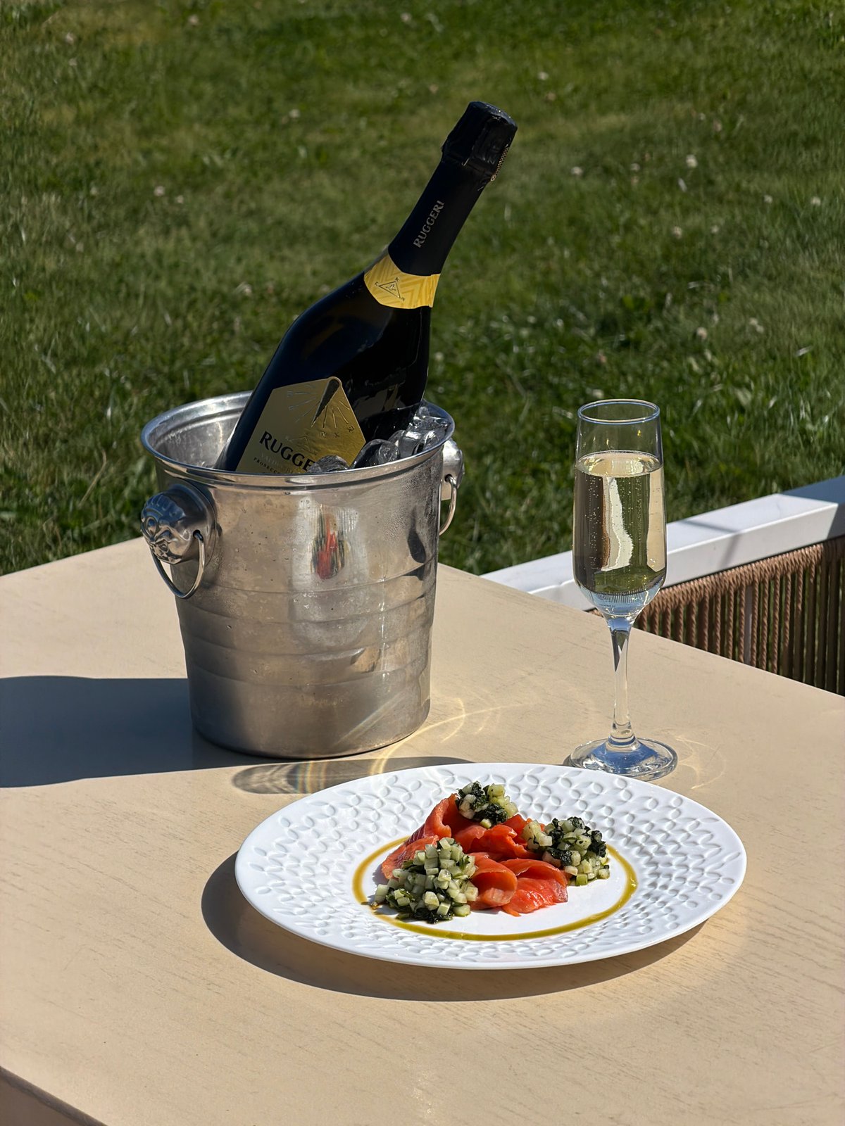 Prosecco, salmon, and green cocktails at a relaxed brunch table