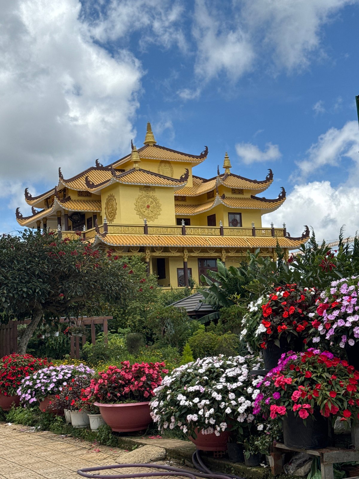 Buddhist temple ceremony with food offerings in Da Lat