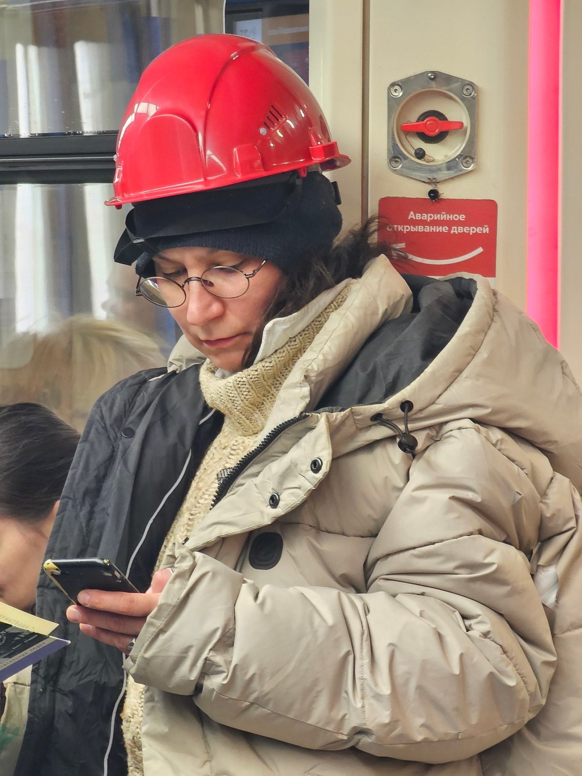 Morning commuters rest, sleep on Moscow Metro trains