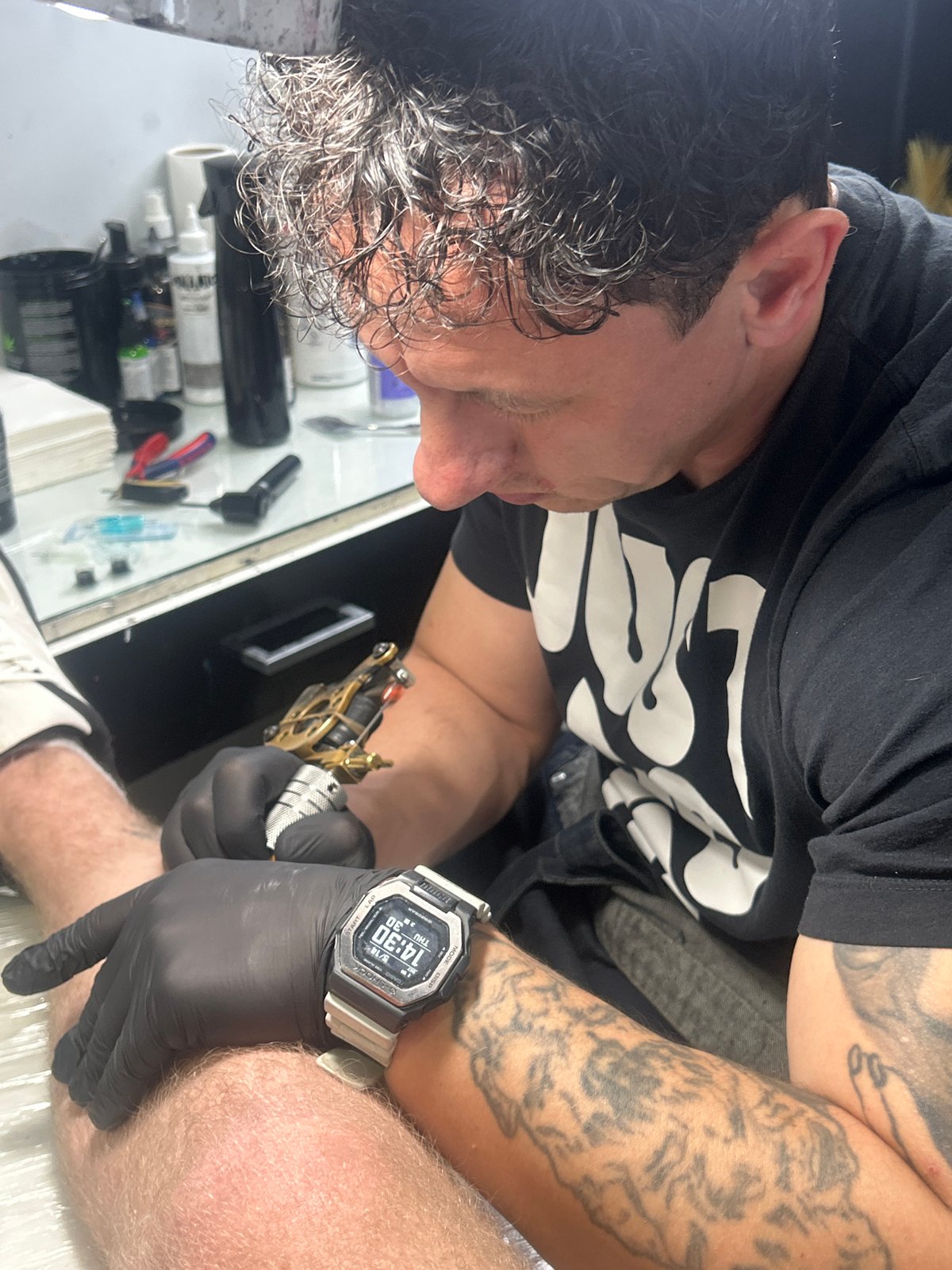 Tattoo session documented at Targovishte business