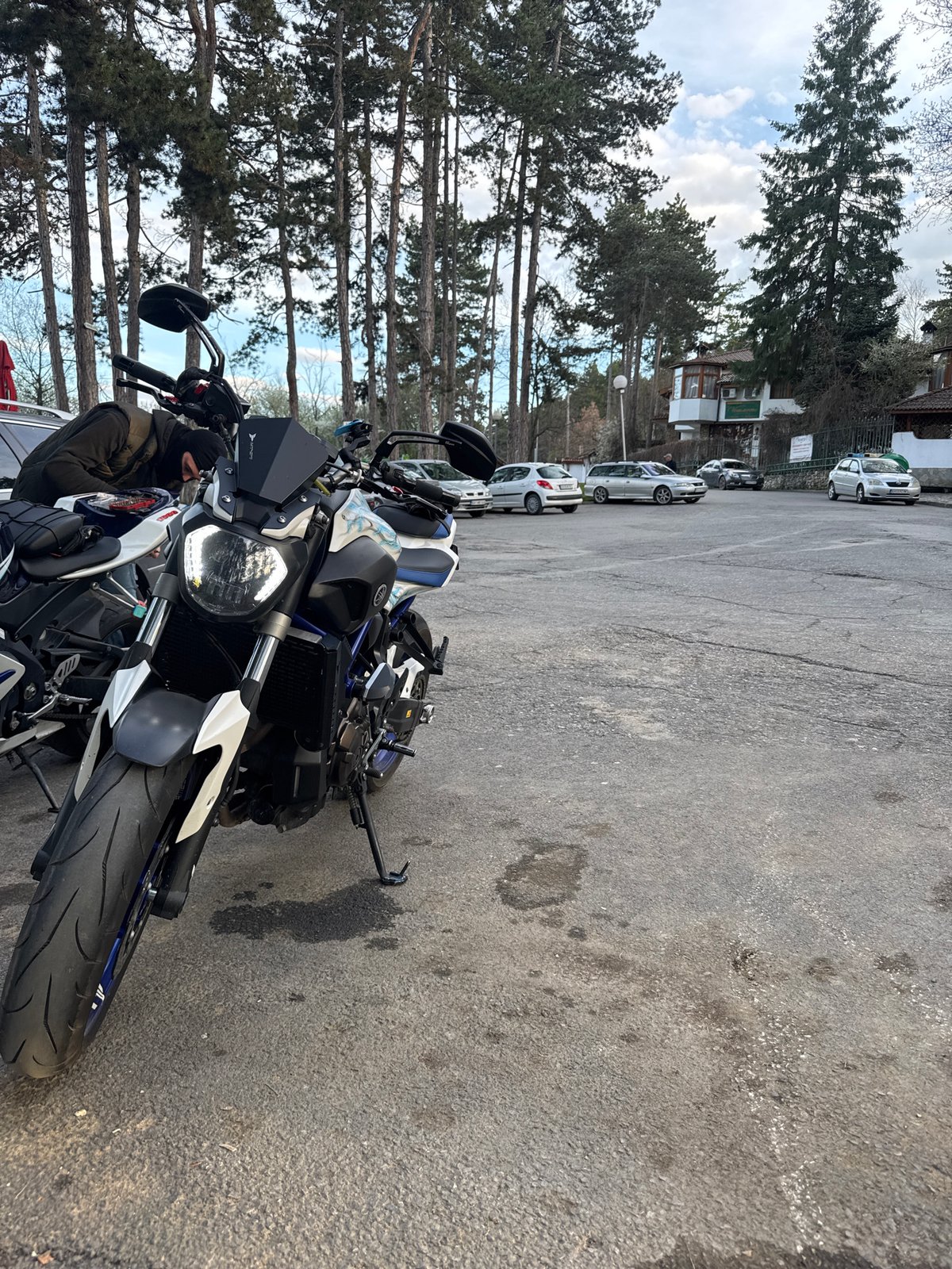 Motorcycles parked near Easter egg display in Kyustendil, Bulgaria
