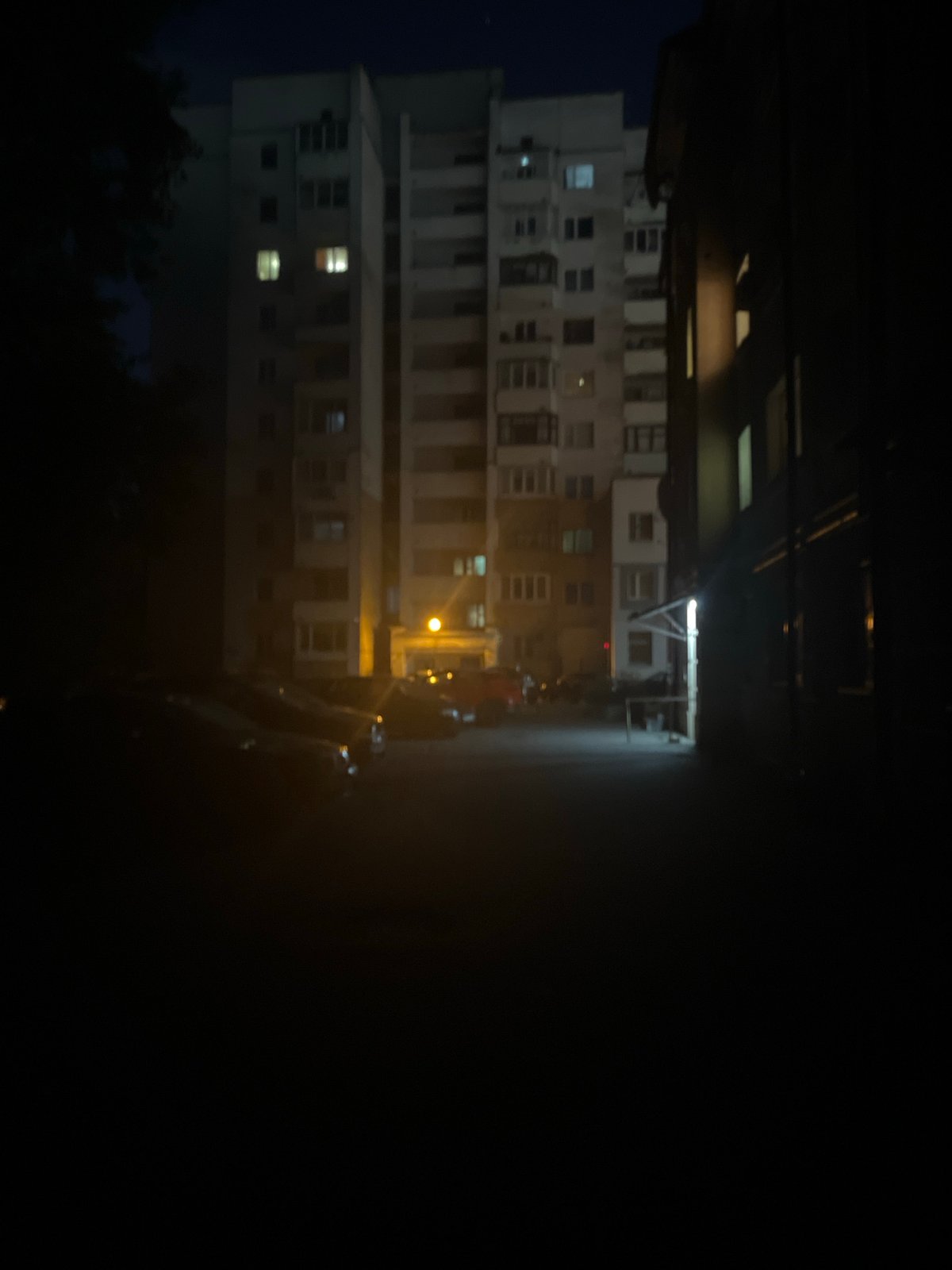 Nighttime streets of Vitsebsk, flags on lampposts, city quiet