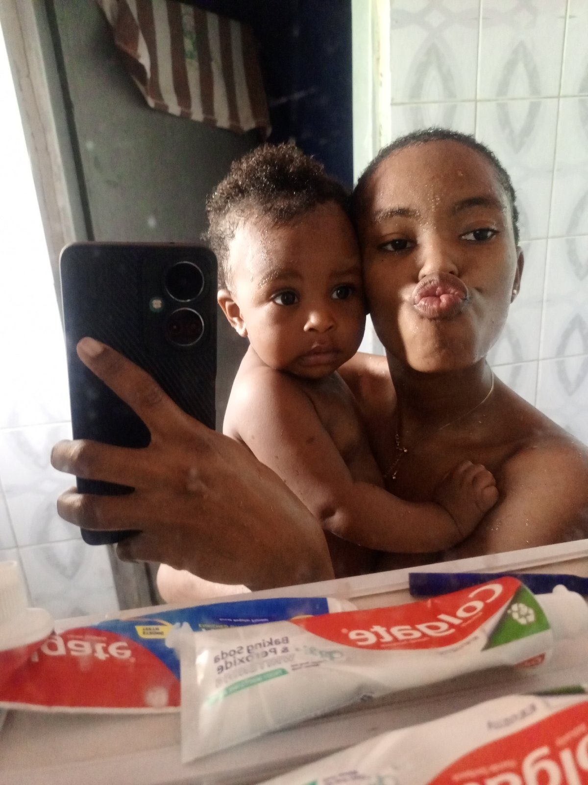 Woman takes playful selfie series in Keffi, Nigeria