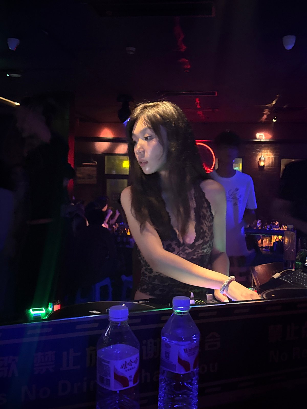 DJ set underway at a packed Liangjiang nightclub