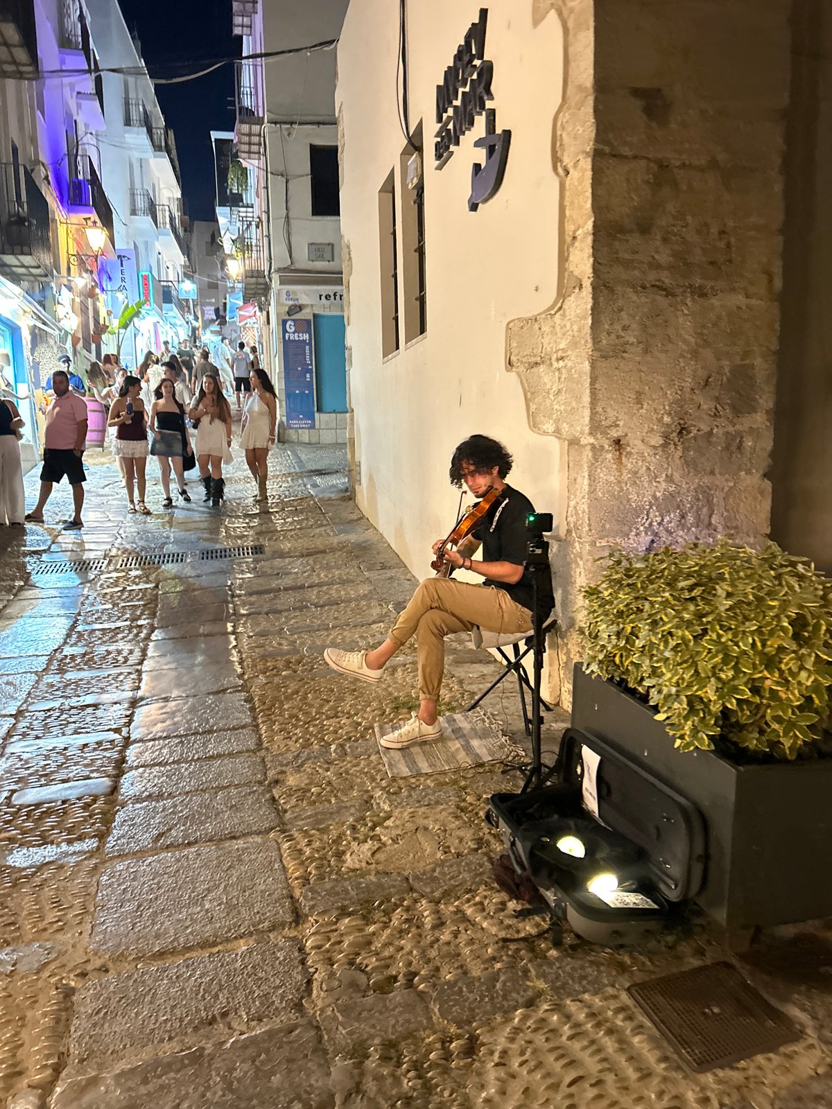 Peníscola's old town buzzes on a summer evening
