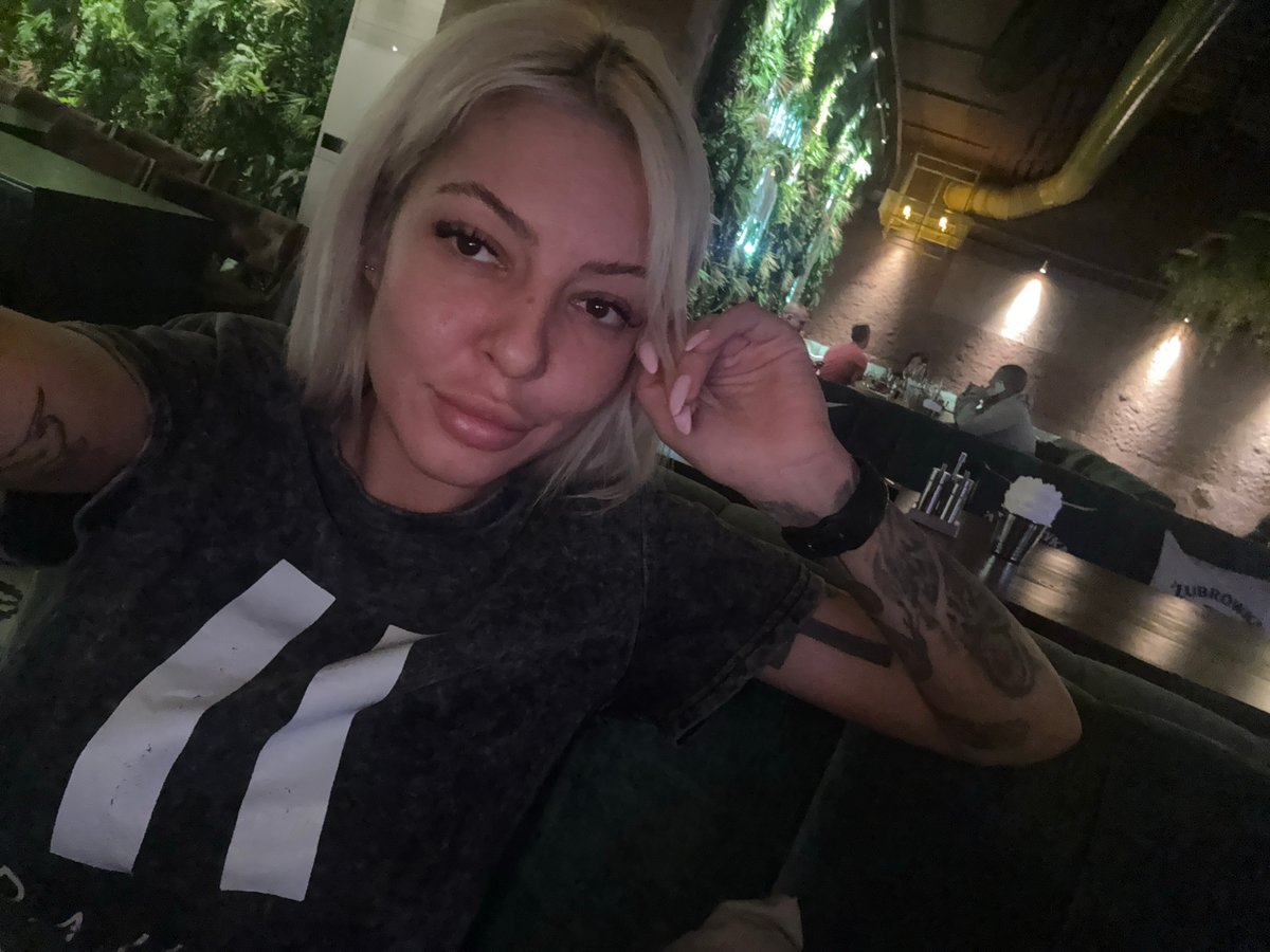 Woman documents dinner experience at Plovdiv restaurant