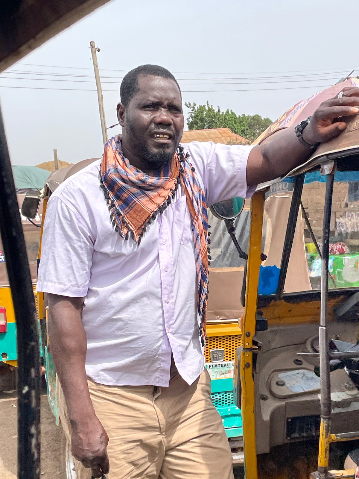 Morning street life documented across Jos, Nigeria neighborhoods