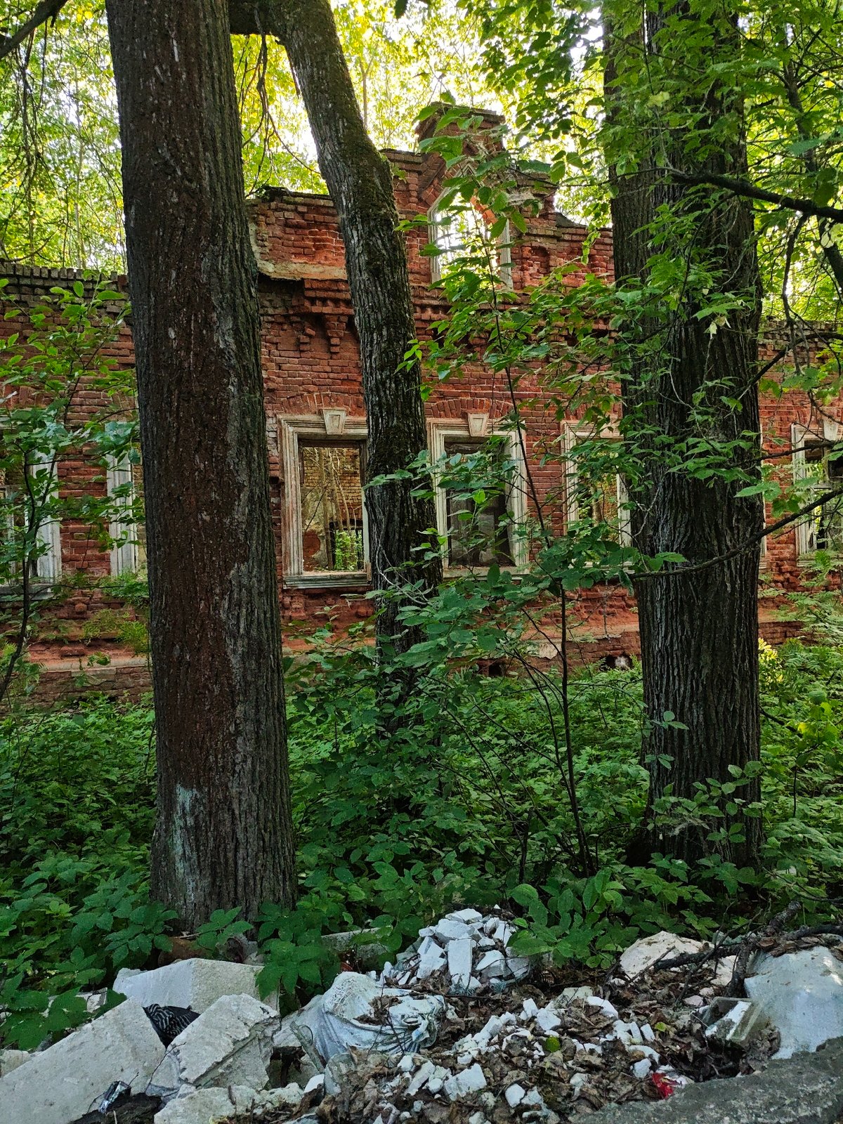 Abandoned brick building documented in decay in Боровково, Russia