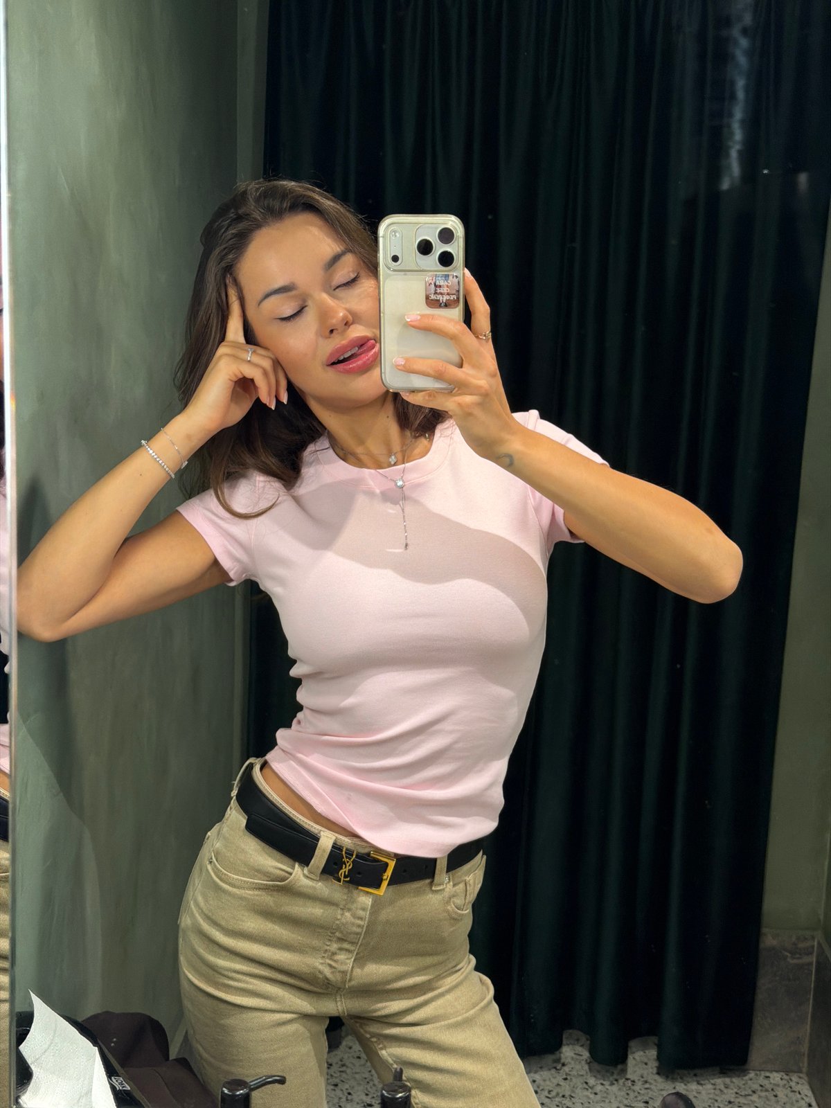 Woman takes selfies during shopping trip in Saint Petersburg